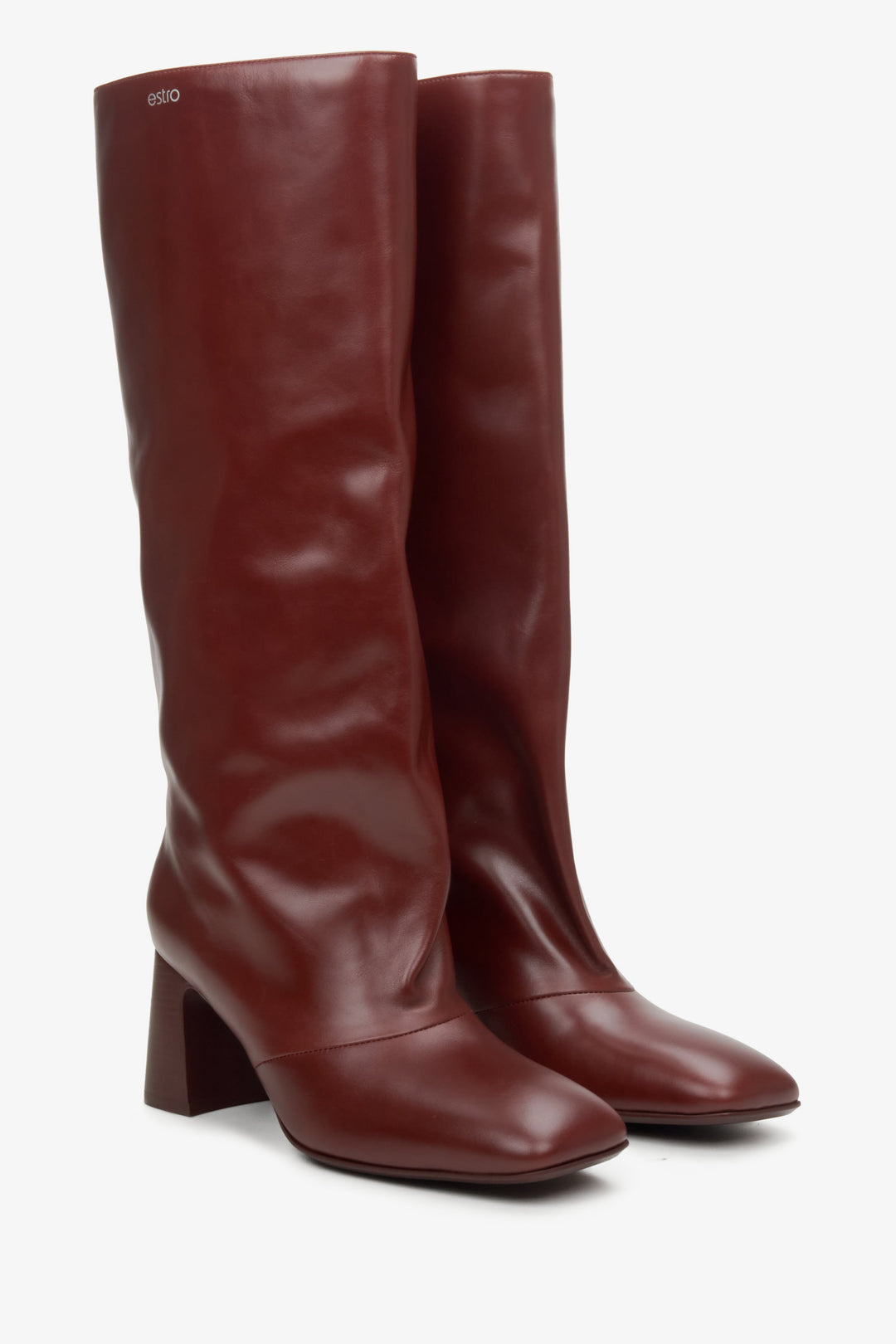 Women's burgundy leather high boots with overdimensioned shaft.