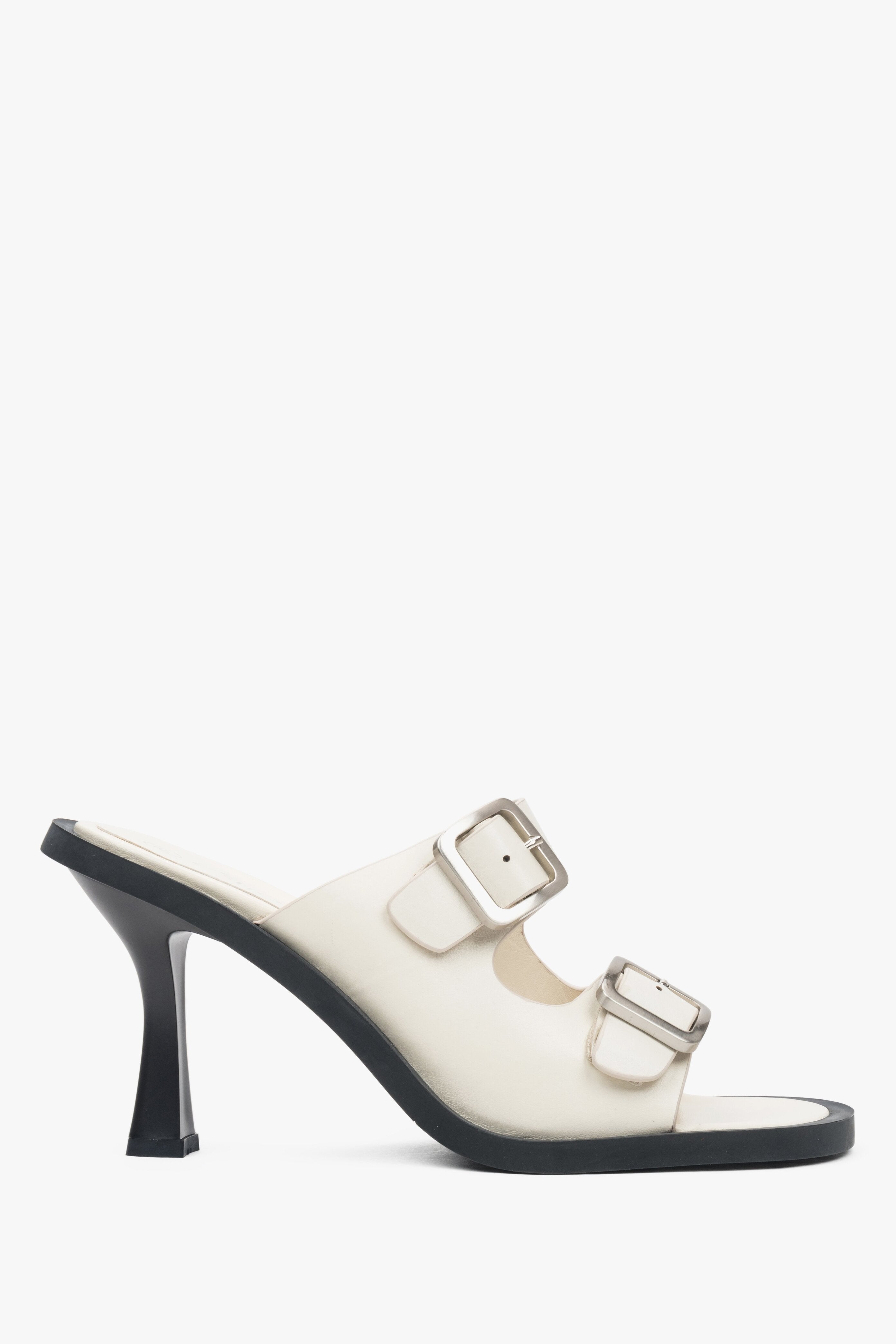 Women's leather white mules with a buckle from Estro - shoe profile.