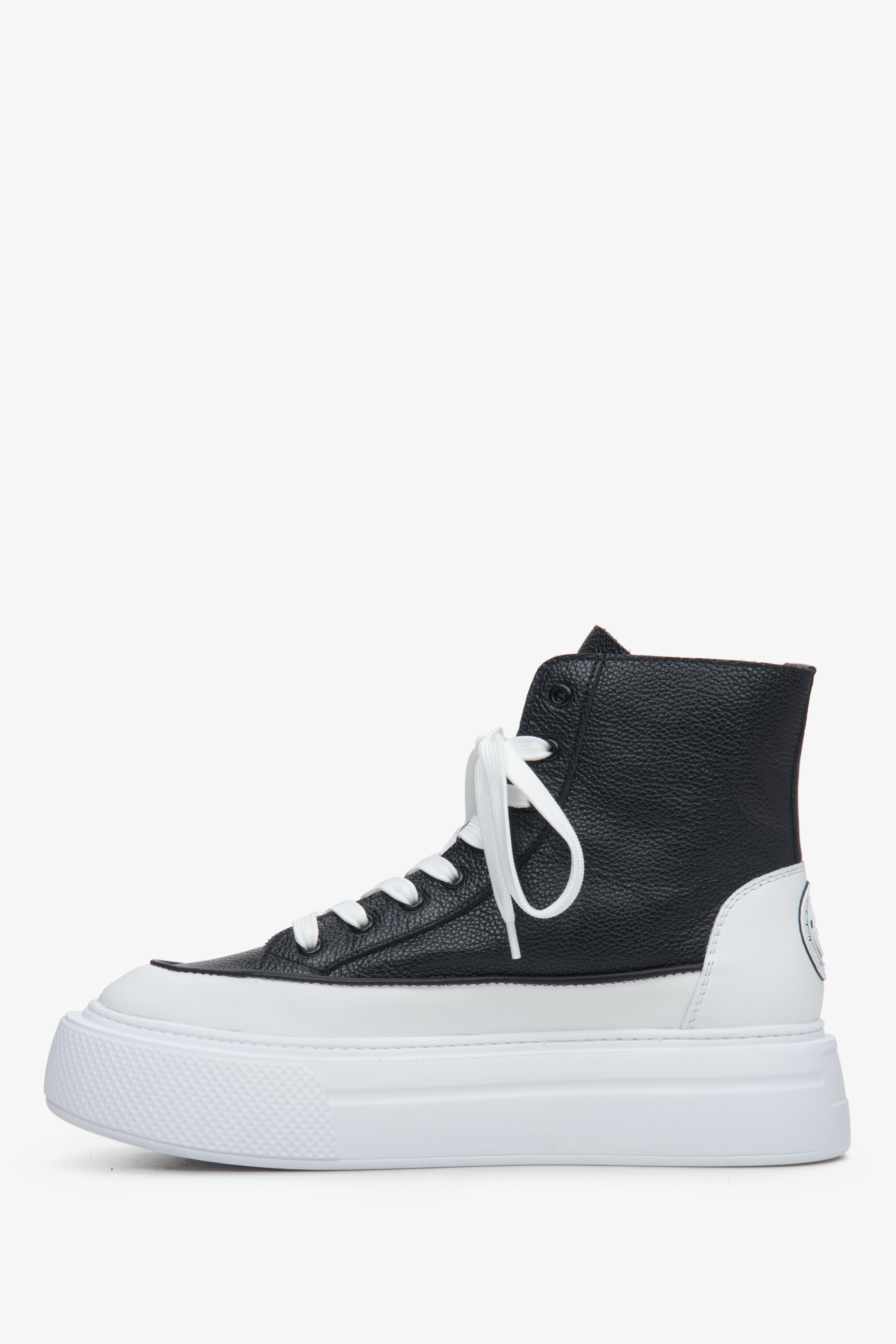 Women's white and black high-top sneakers made of genuine leather by Estro - profile view of the shoe.