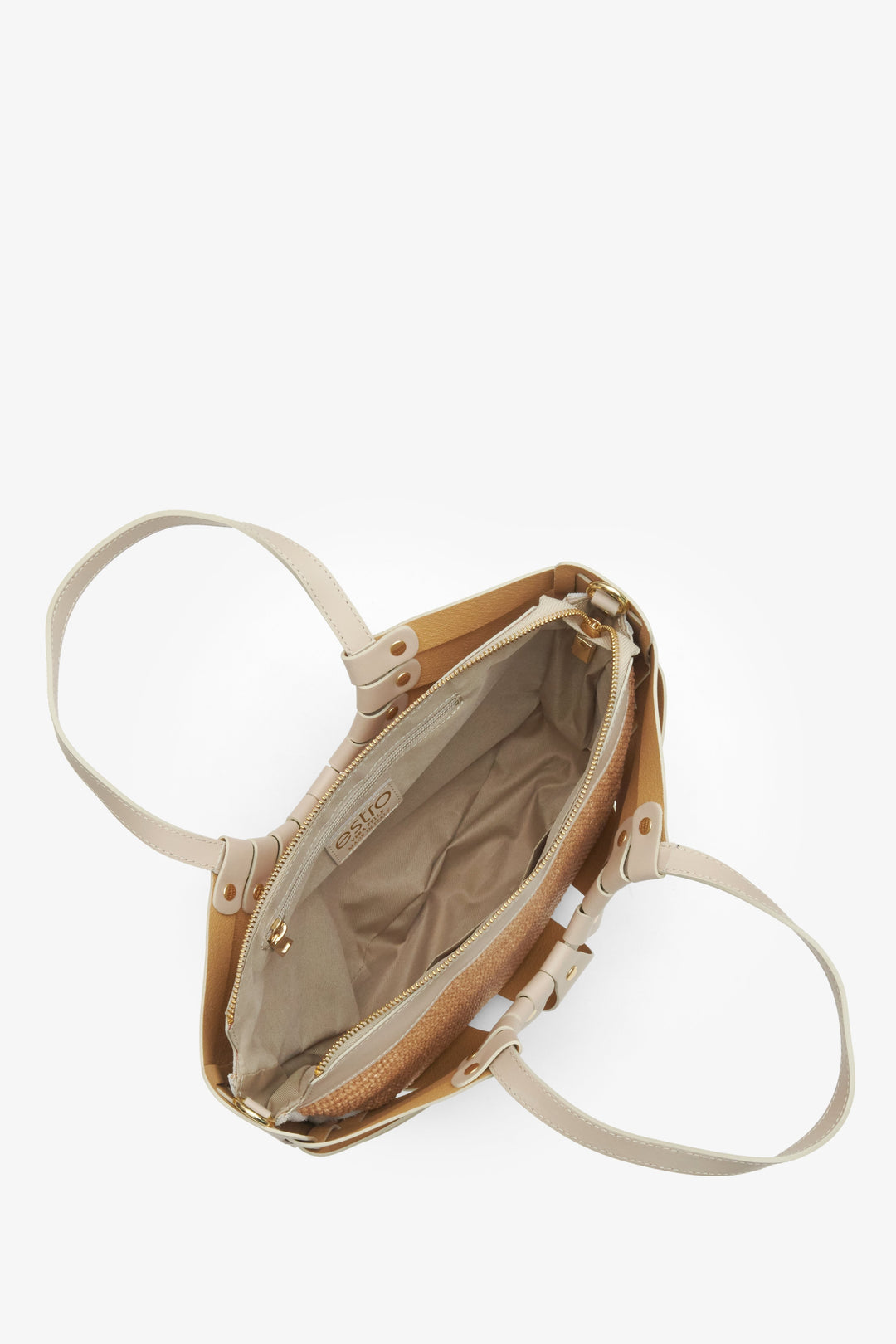 Interior presentation of the Estro beige leather women's basket handbag.