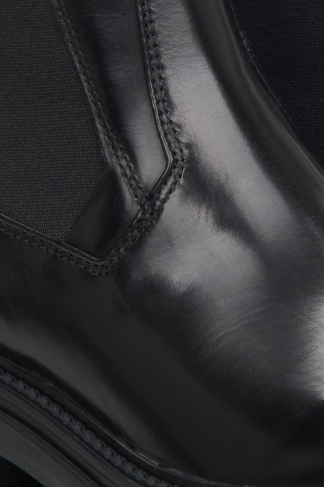 Women's black leather Chelsea boots - a close-up on details.