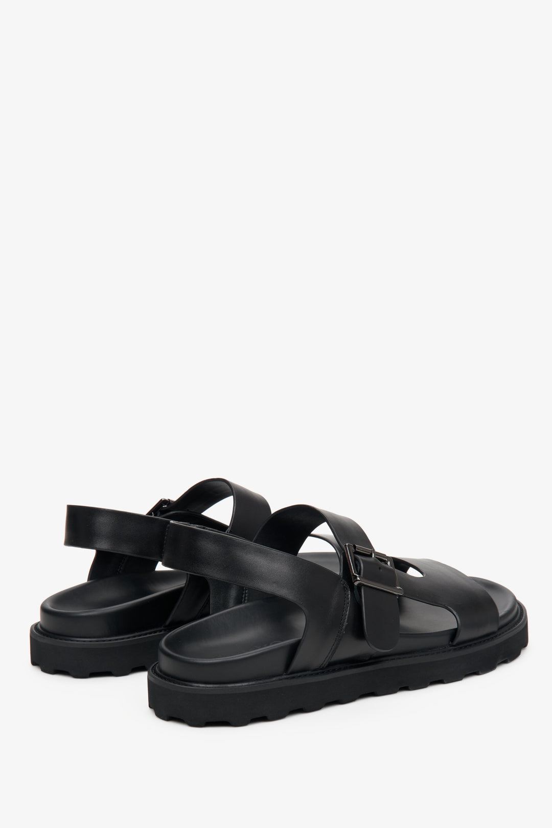 Men's black sandals made of genuine leather, Estro brand - a close-up on heel line.