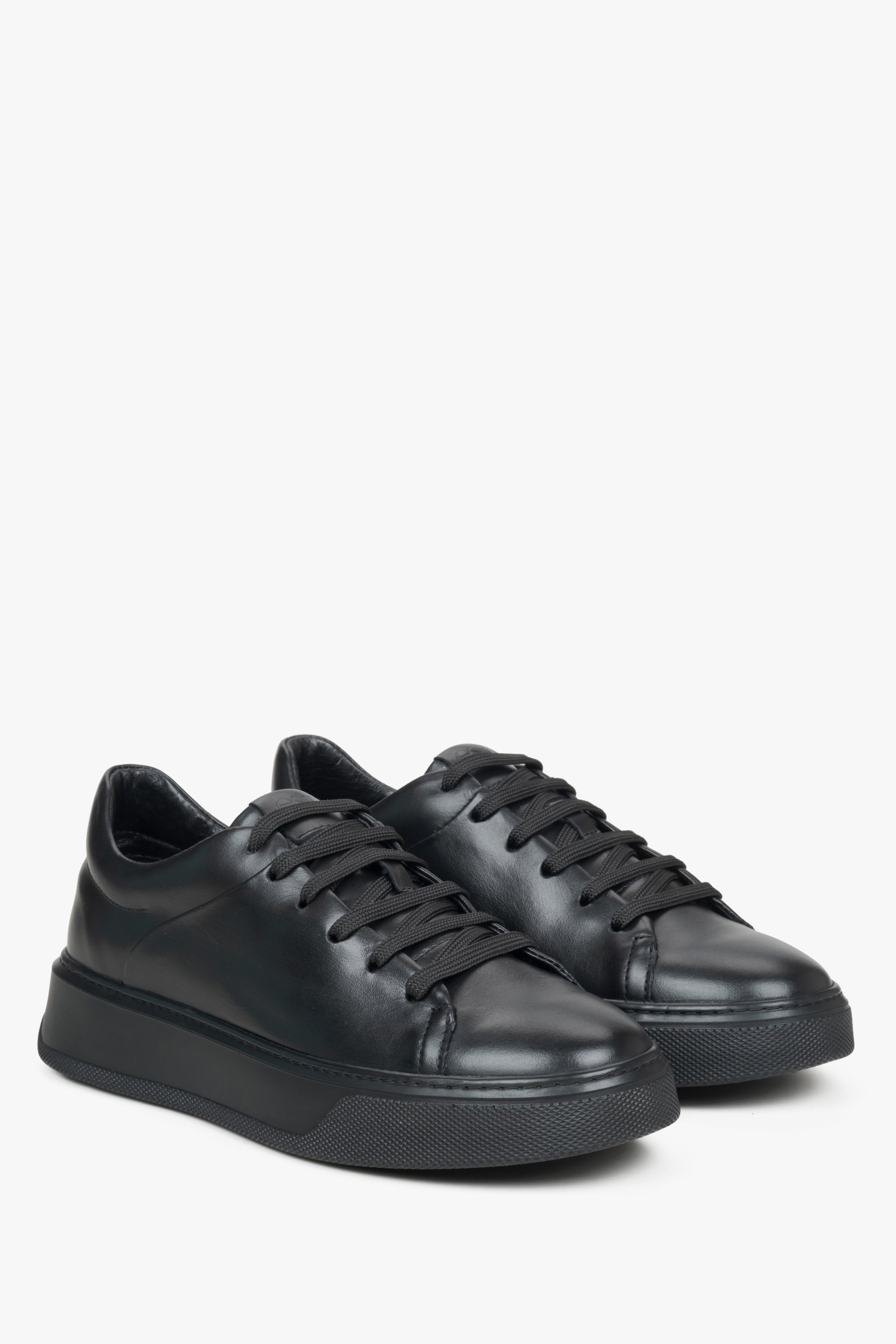 Women's black sneakers Estro made of leather.