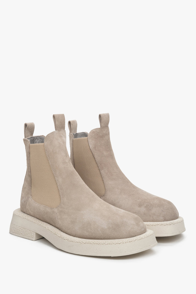 Women's beige Chelsea boots.