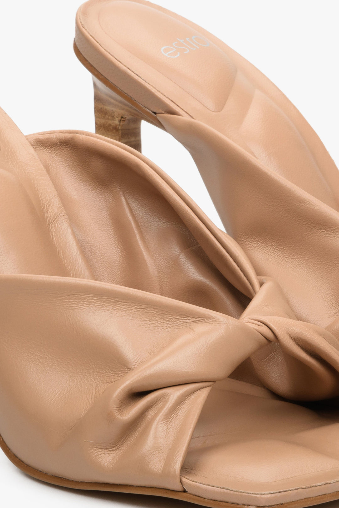 Women's beige high heel mules by Estro - close-up on details.