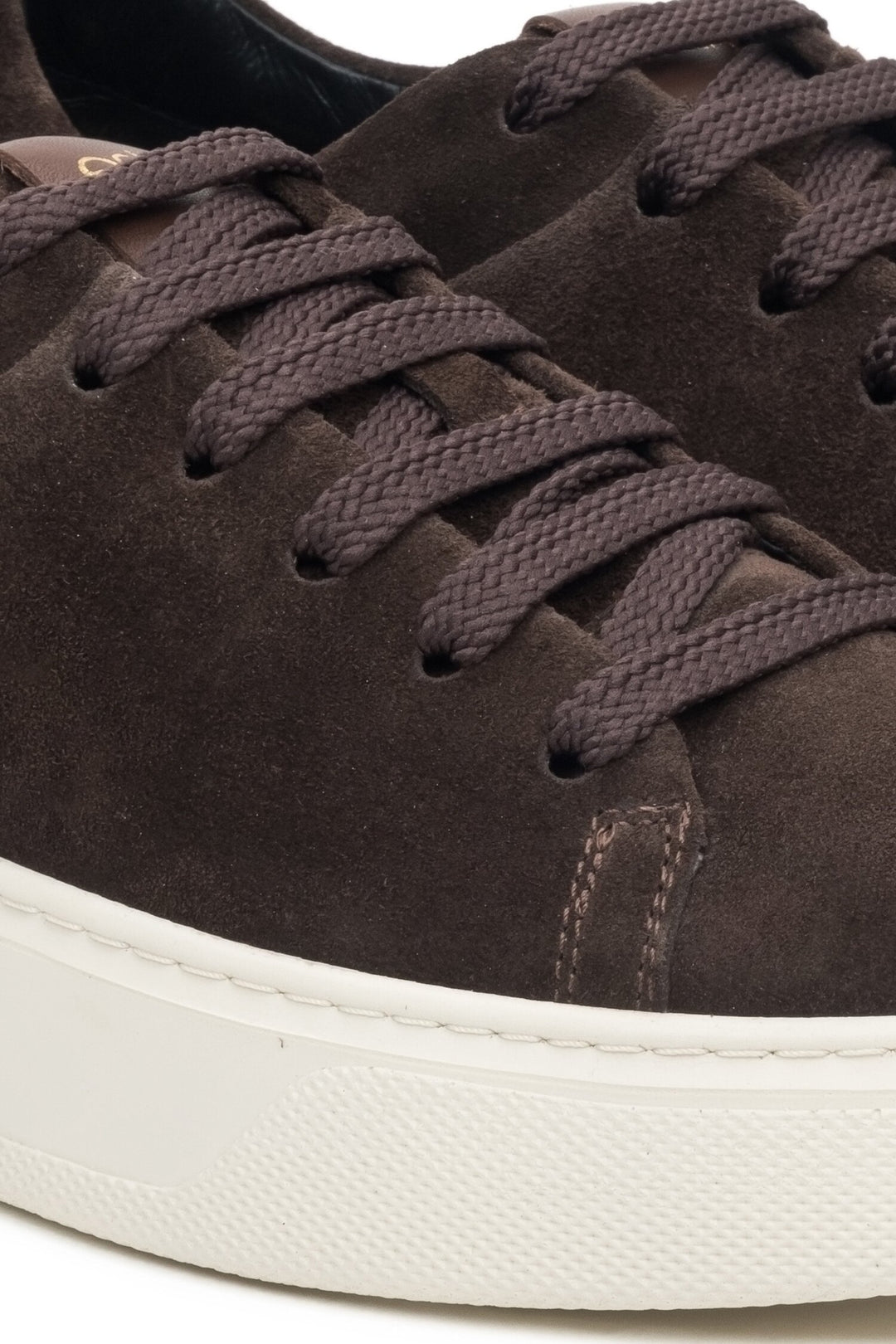 Women's dark brown sneakers made of natural velour by Estro - close-up on details.