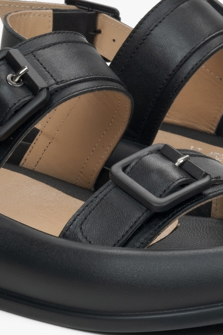 Women's black leather sandals - details.