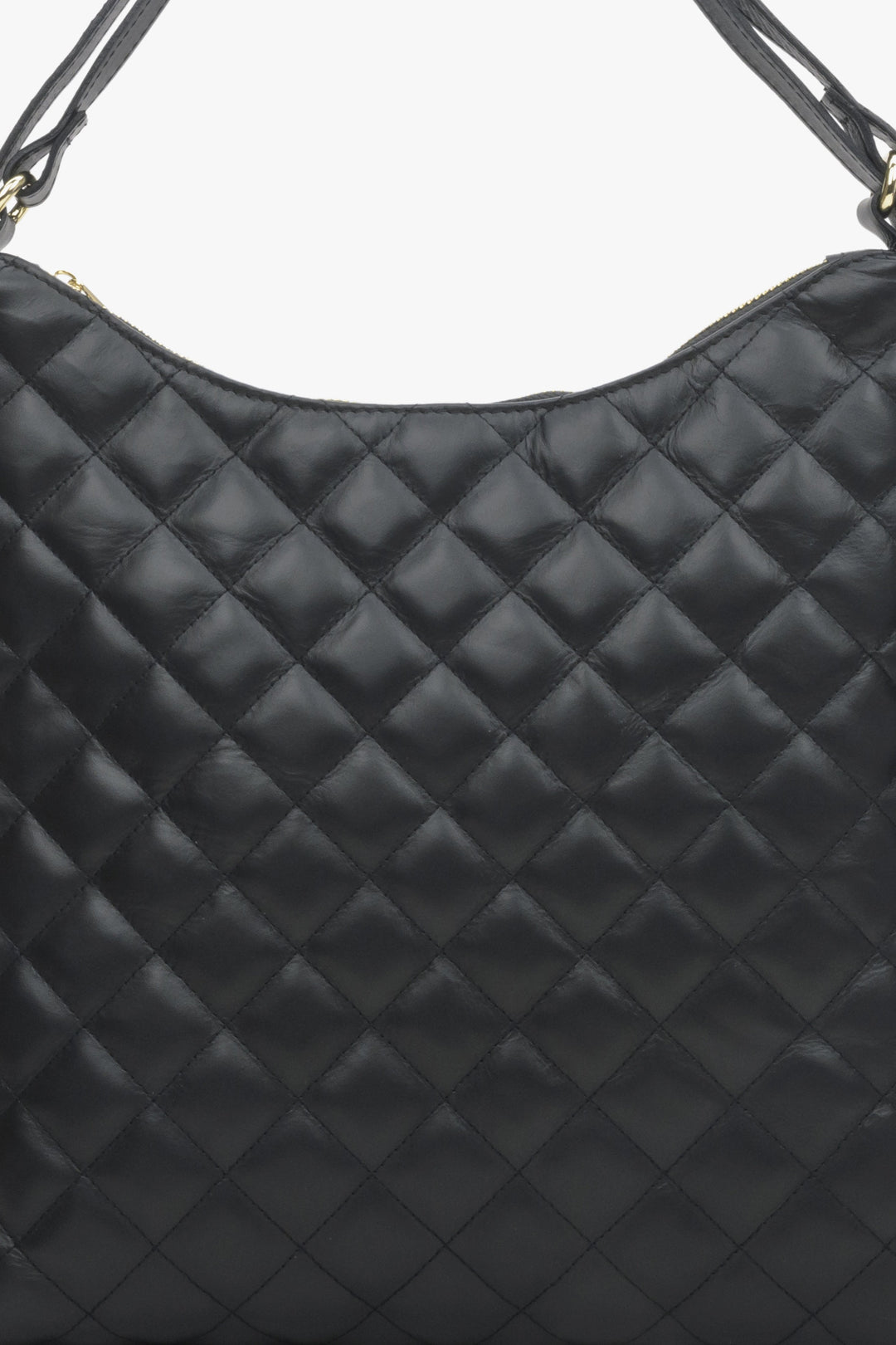 Women's black leather quilted handbag.