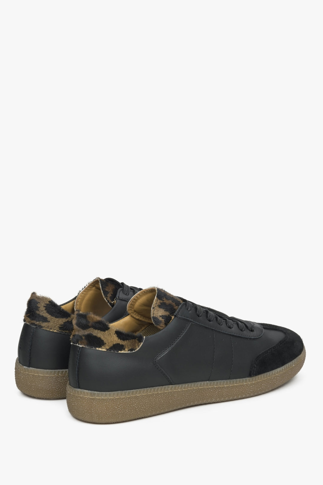 Women's black sneakers made of genuine leather with an Estro animal pattern.
