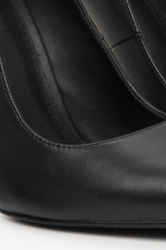 Women's black high heels by Estro - close-up on the details.