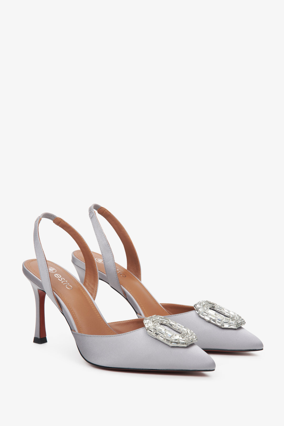 Estro women's open-toe stiletto heels in silver.