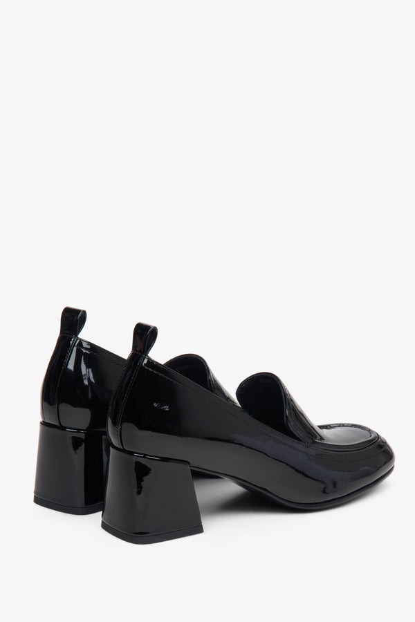 Women's black loafers in black colour - a close-up on heel counter.