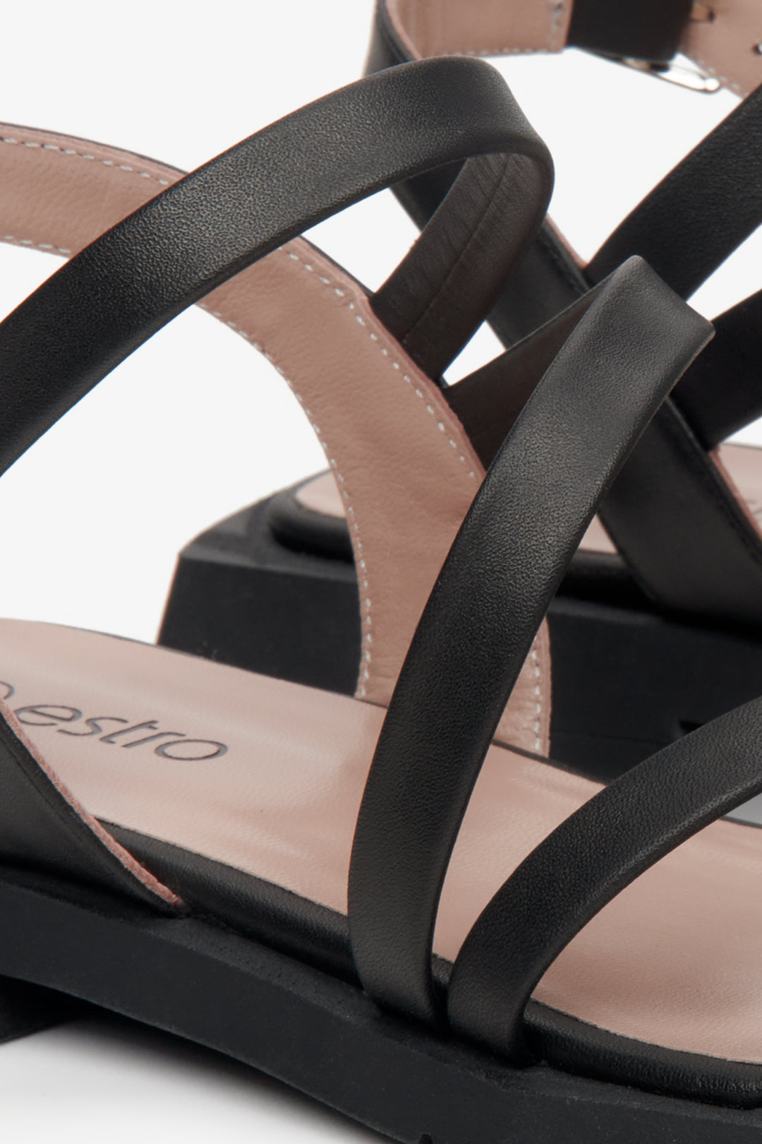 Leather, women's black sandals by Estro with thin straps - presentation of the rear part of the footwear.