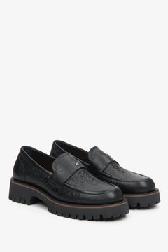 Women's black leather loafers by Estro.