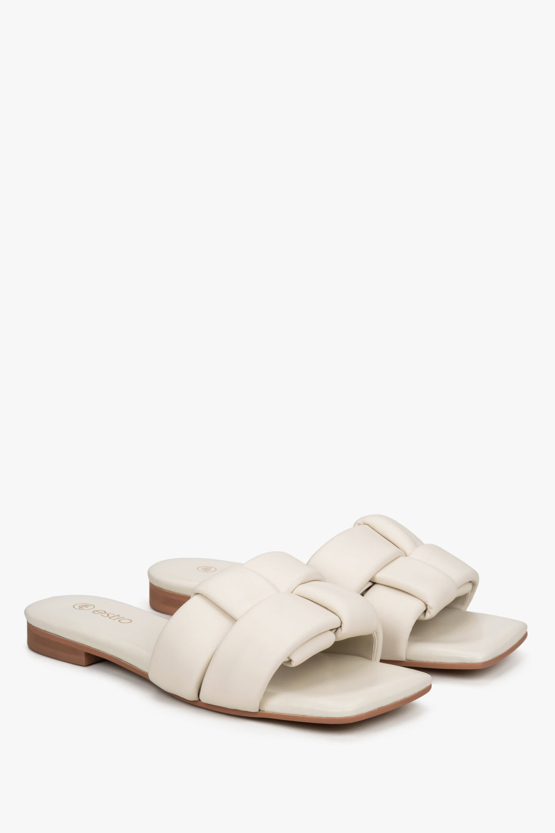 Women's light beige leather flat slides by Estro.