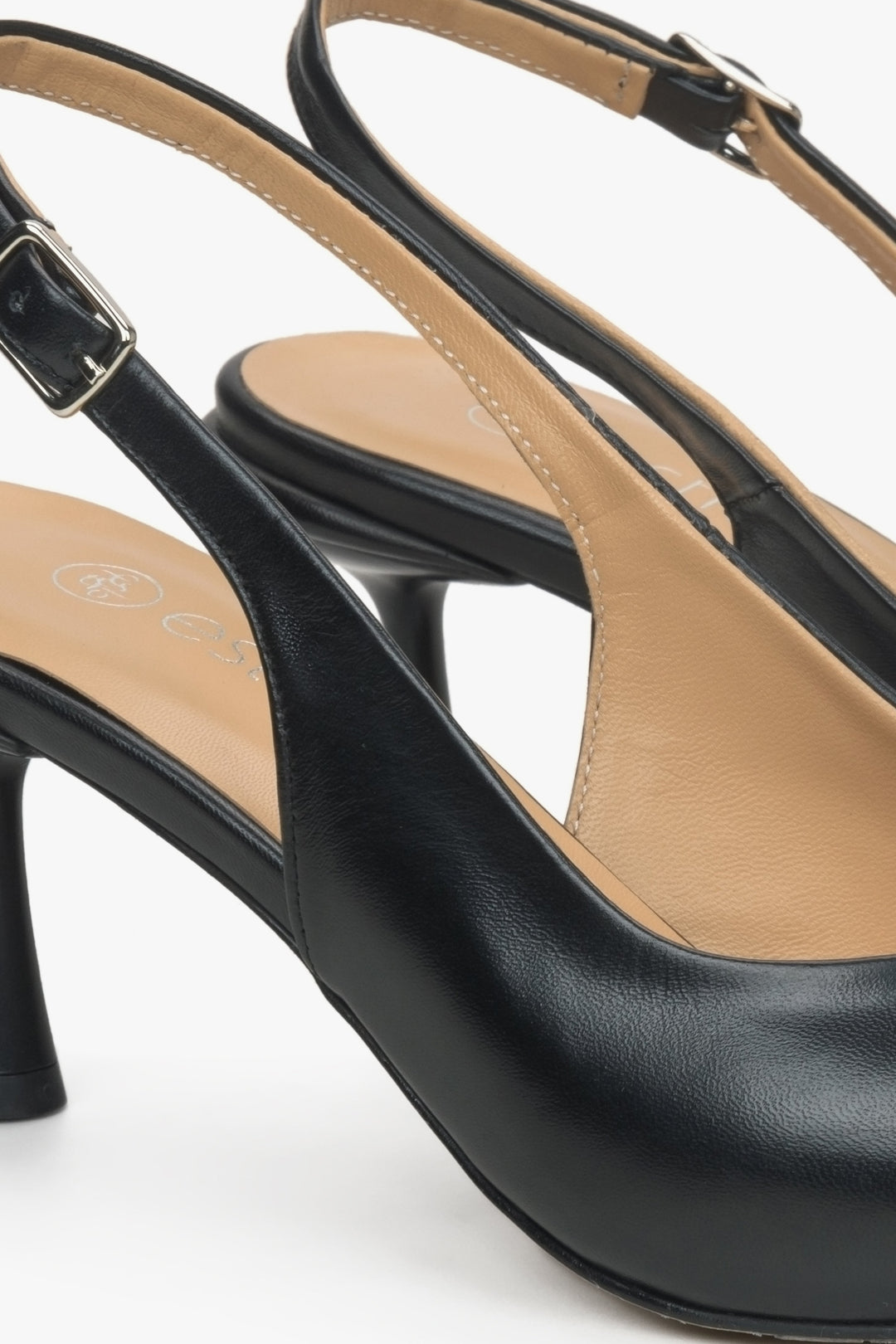 Women's black leather slingback shoes by Estro - close-up on the detail.