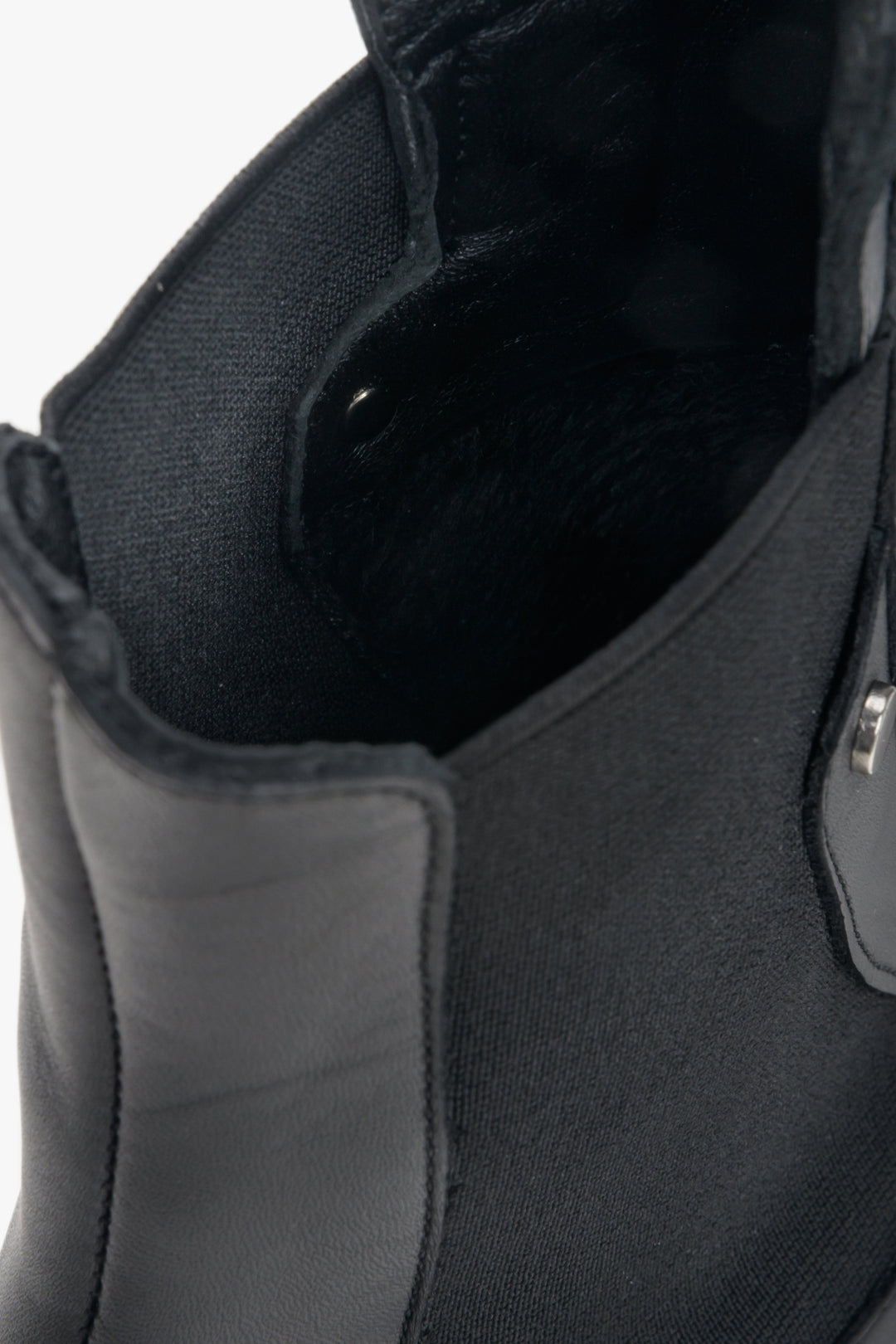 Women's leather and textile ankle boots in black - close-up on details.