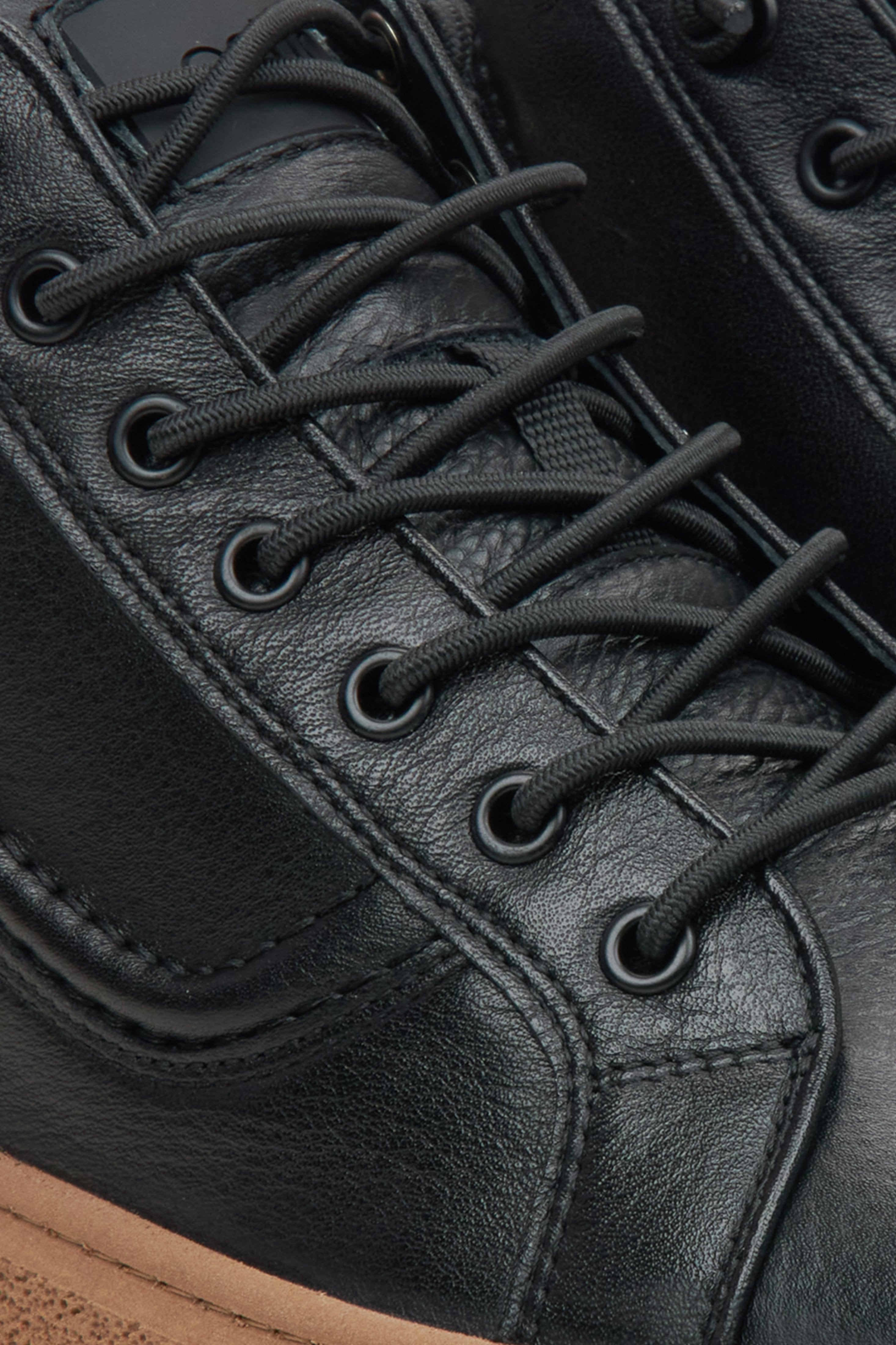 Men's black leather sneakers - details.