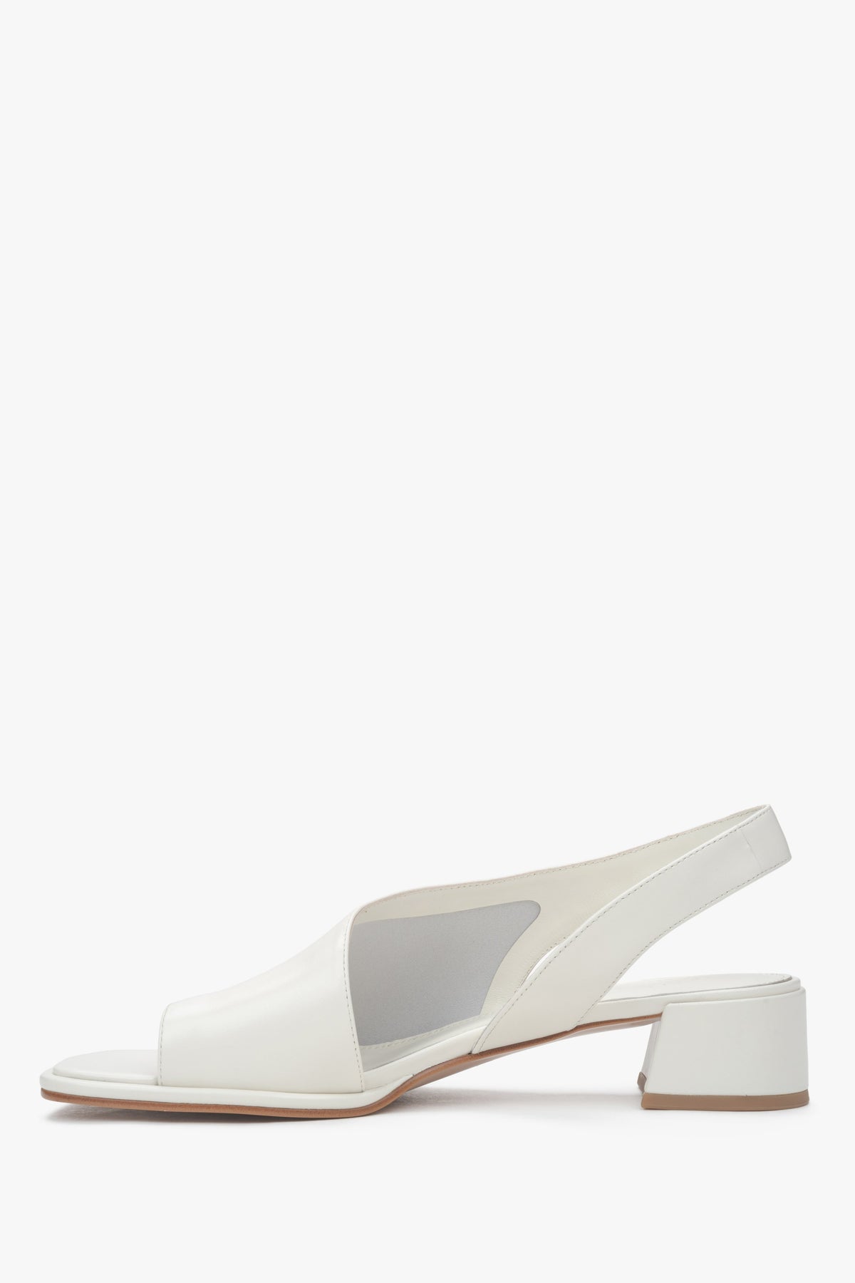 Stylish white women's sandals by Estro, crafted from high-quality genuine leather, offering comfort with a low heel.