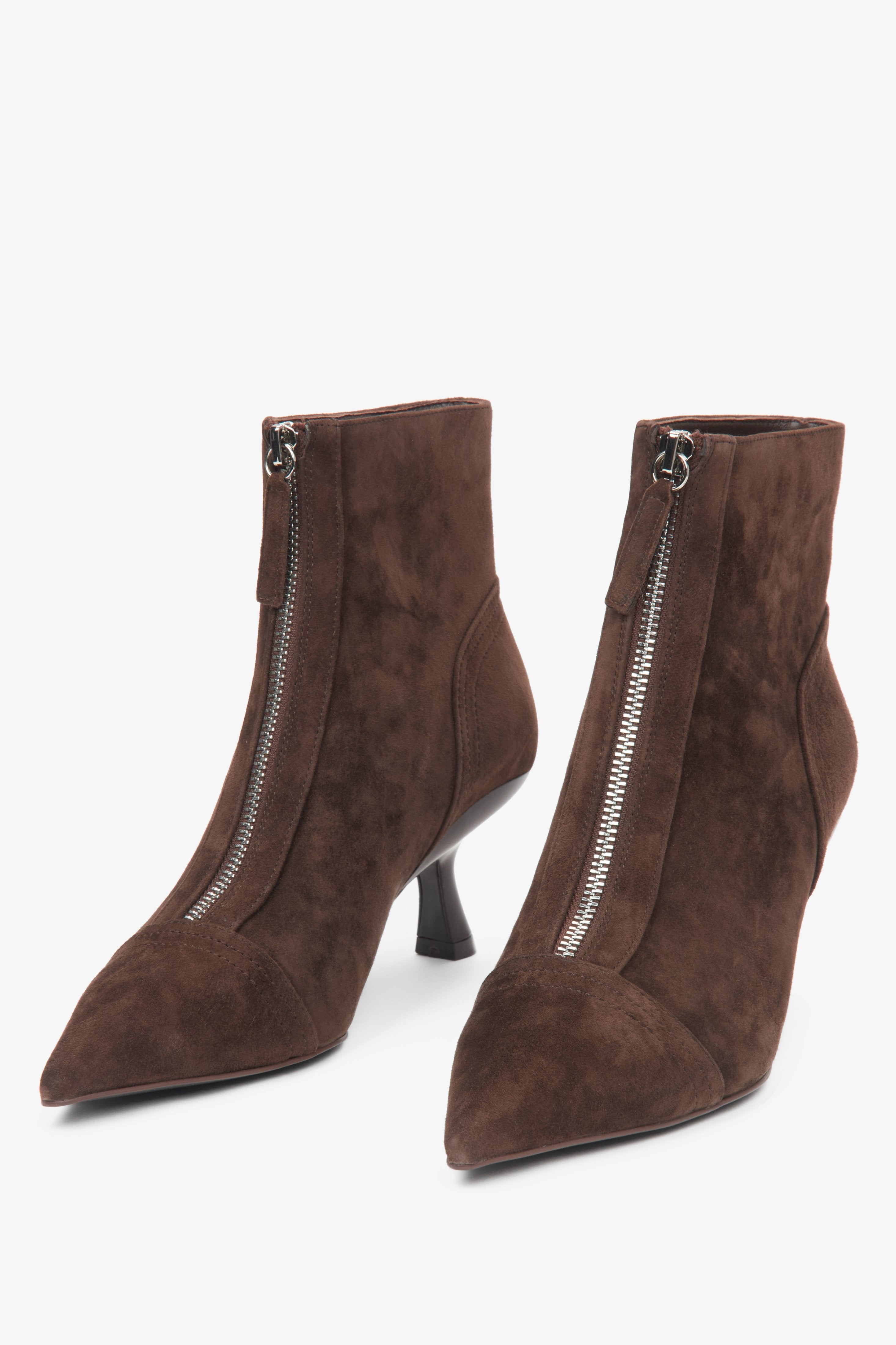 Women's dark brown ankle boots made of natural velour with a low stiletto heel by Estro.