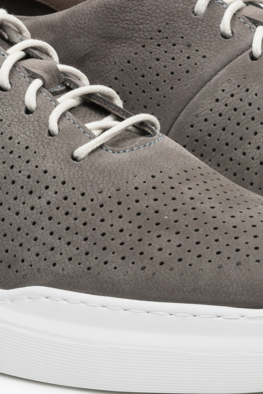 Perforated grey men's sneakers by Estro for summer - close-up on the details.