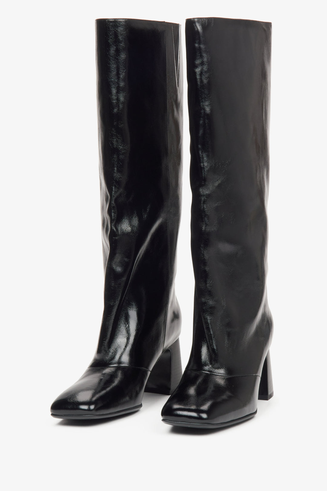 Estro women's black knee-high boots with a wide shaft and a block heel made of genuine cpatent leather - front view presentation.