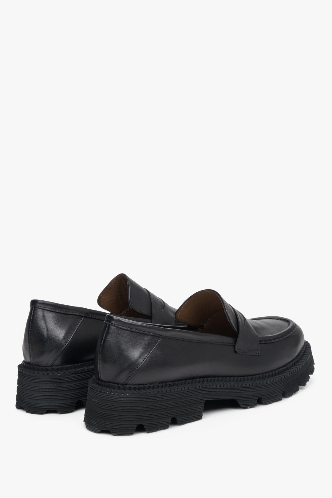 Women's black leather loafers by Estro.