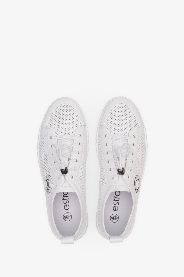 Summer men's sneakers in white made on natural leather - presentation of the shoes from above.