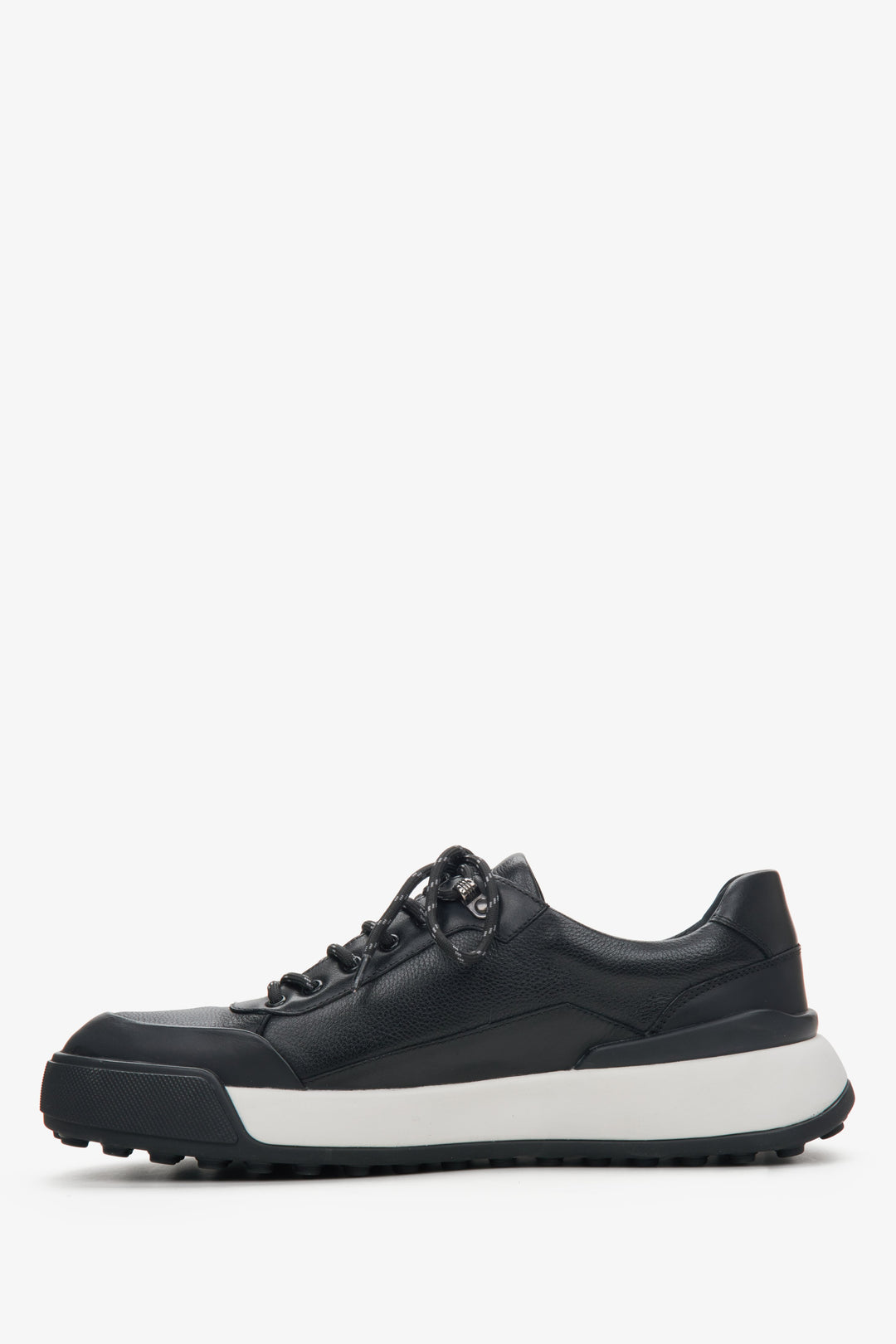 Men's black leather sneakers with a white stripe by Estro - shoe profile.