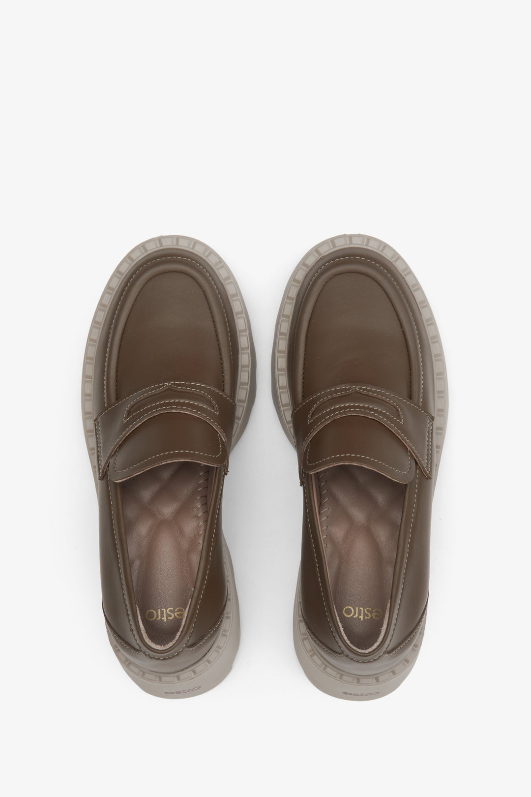 Elegant leather loafers in brown - presentation of the footwear from above.