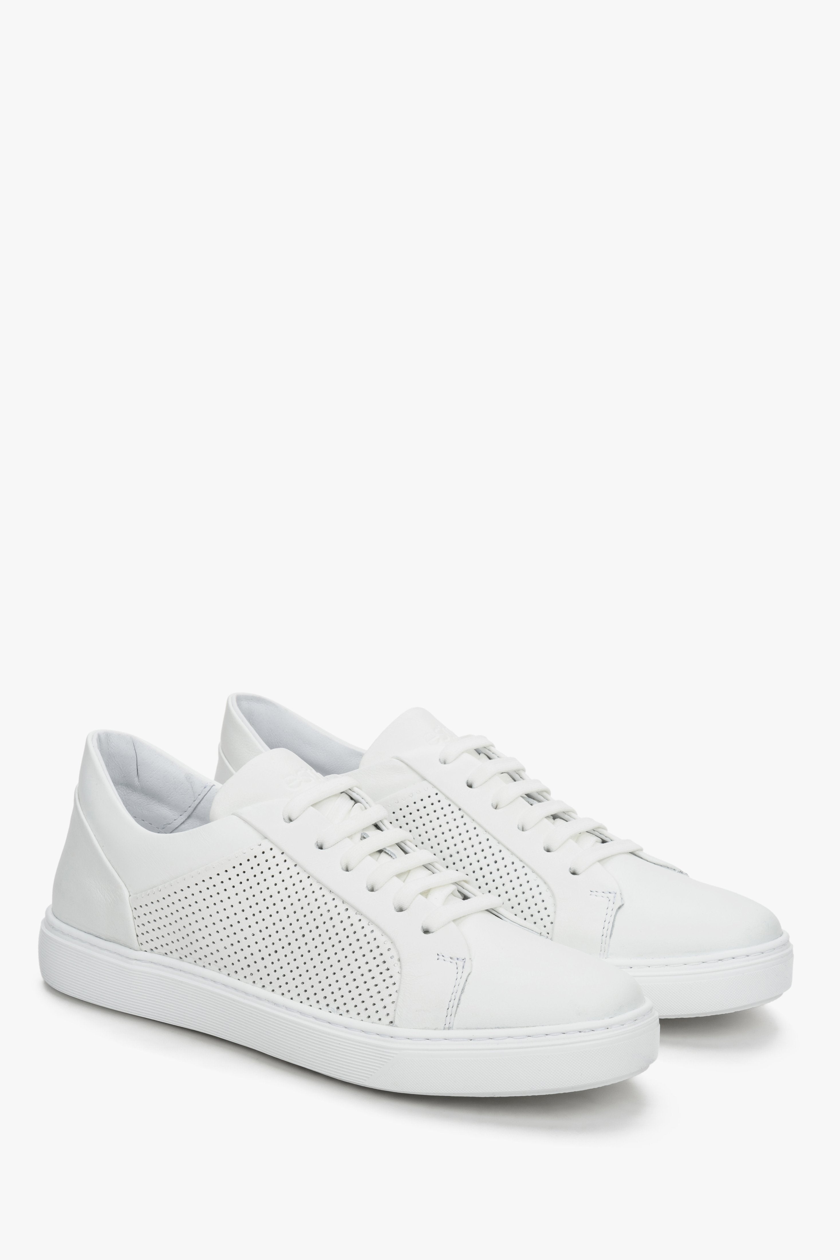 Women's white sneakers made of genuine leather with perforation by Estro.