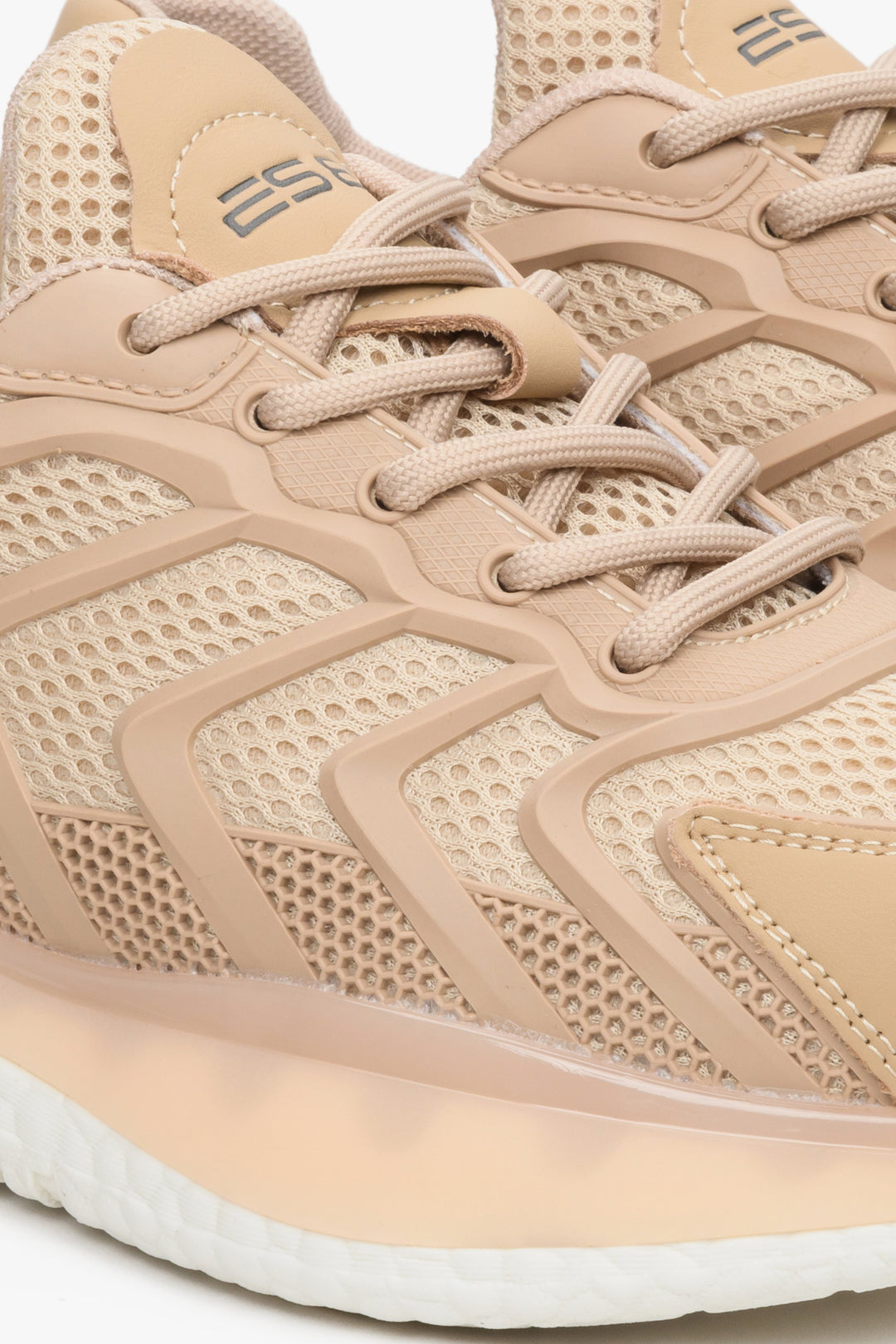 Women's beige sneakers by ES8 - close-up of the laces.