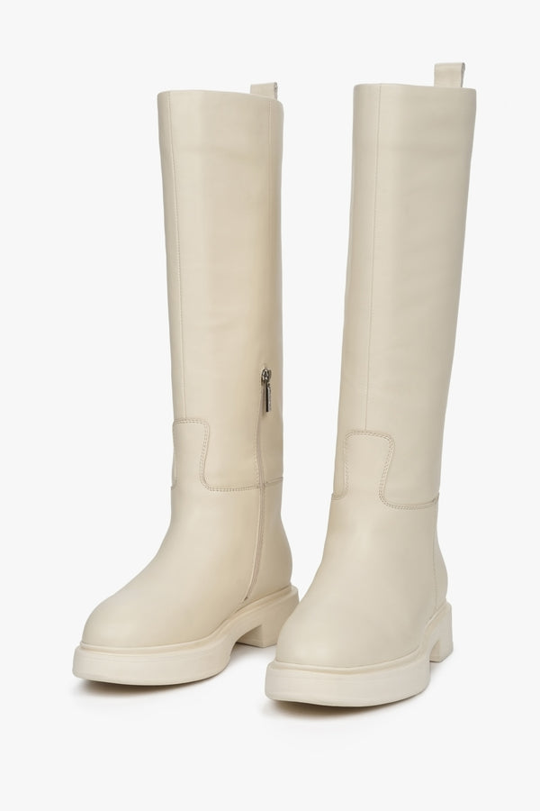 Tall women's boots with insulation by Estro for winter in beige color.