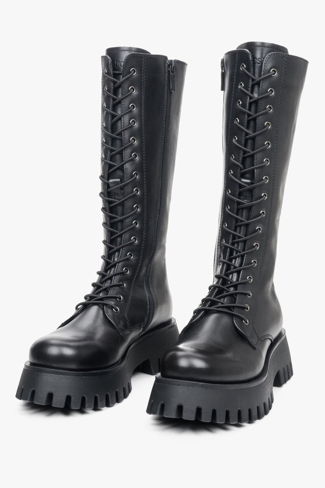 Women's black leather boots with lacing made of genuine leather - presentation of shoe toe.