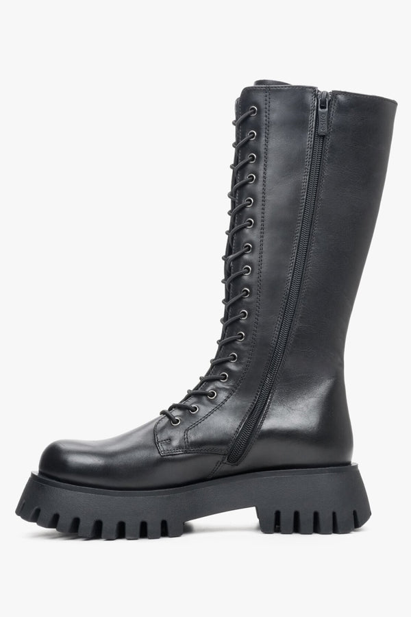 Stylish women's black leather boots with lacing made of genuine leather - shoe profile.