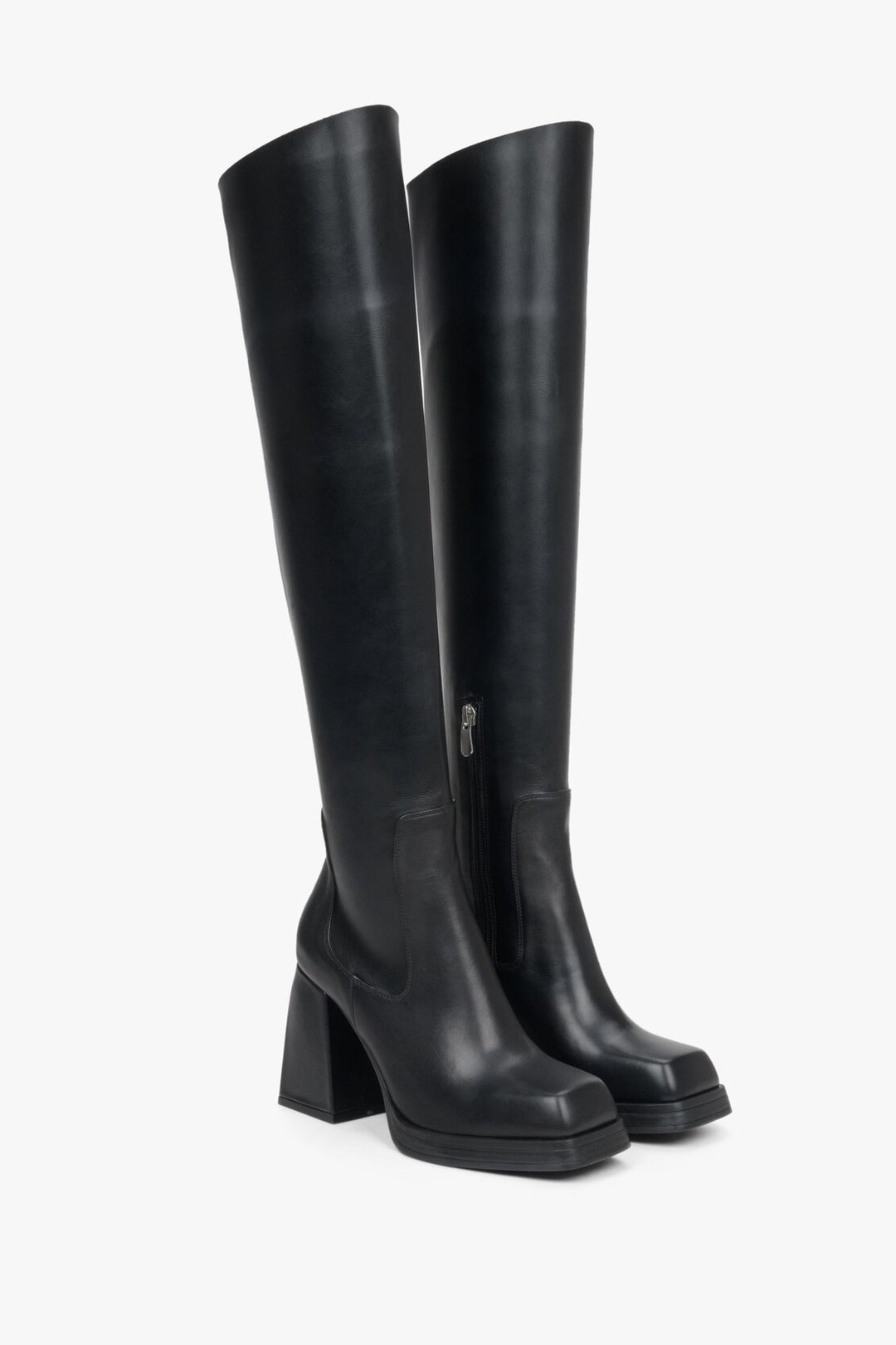 Elegant black women's boots genuine leather - presentation of a shoe toe and sideline.
