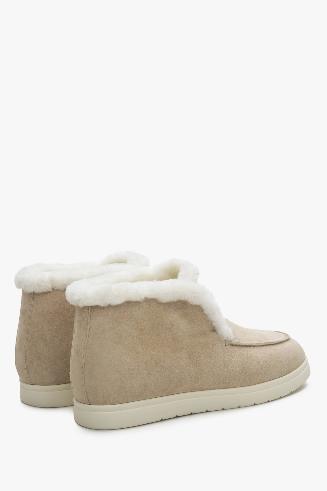 Slip on low-top boots in light beige colour made of velour and fur.