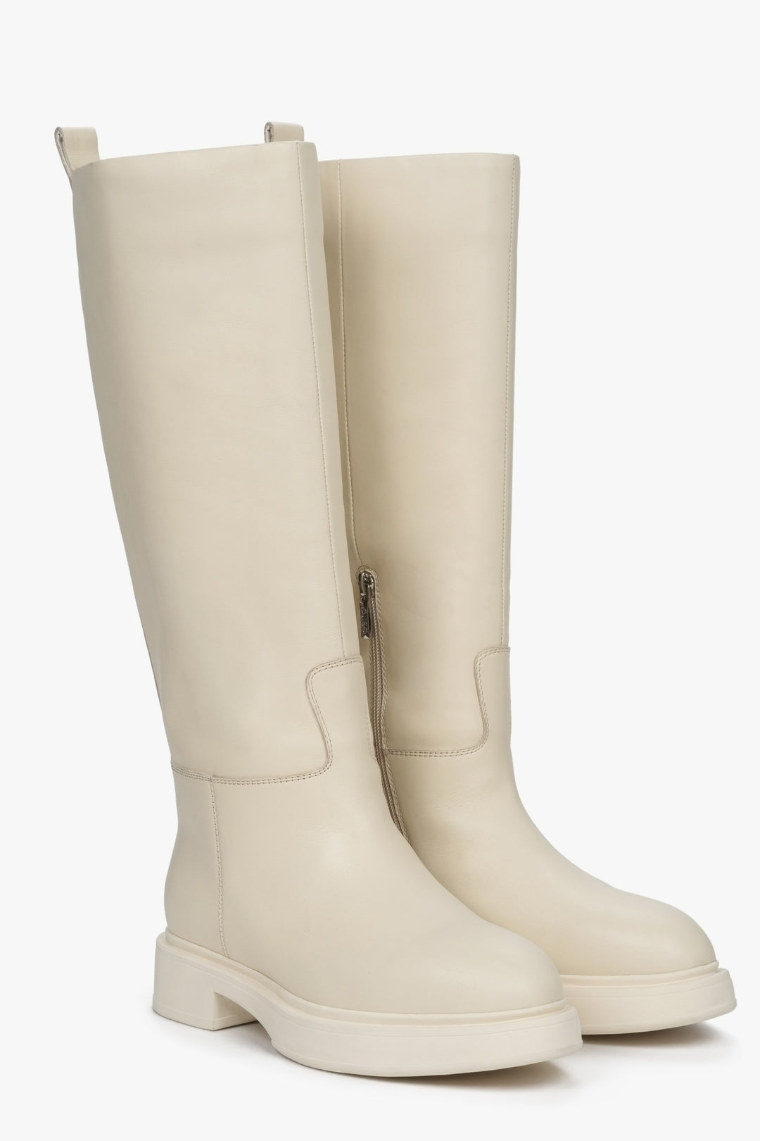 Elevated, beige women's winter boots by Estro made of genuine leather with natural fur lining.