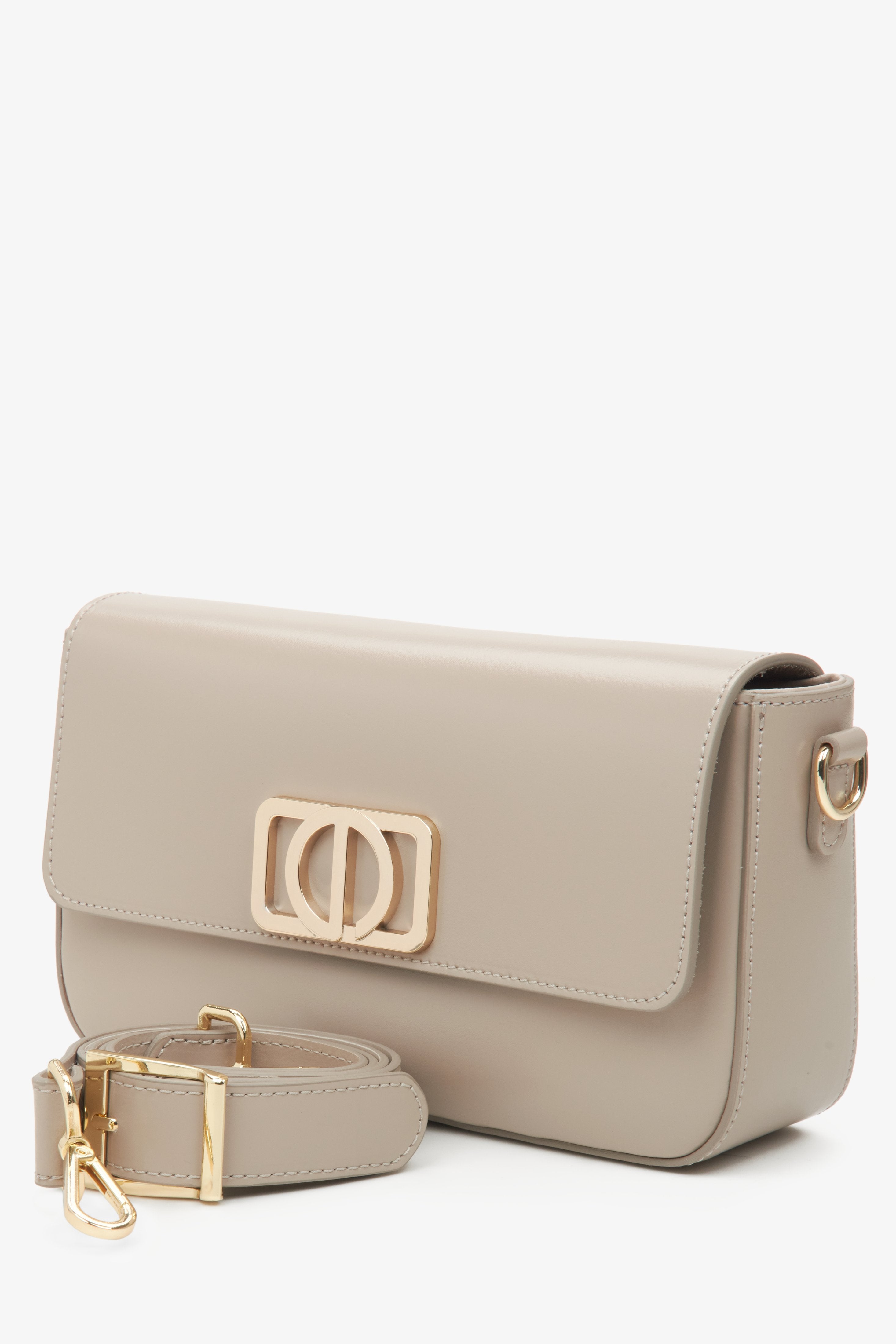 Beige baguette-style handbag, small in size, designed for women.