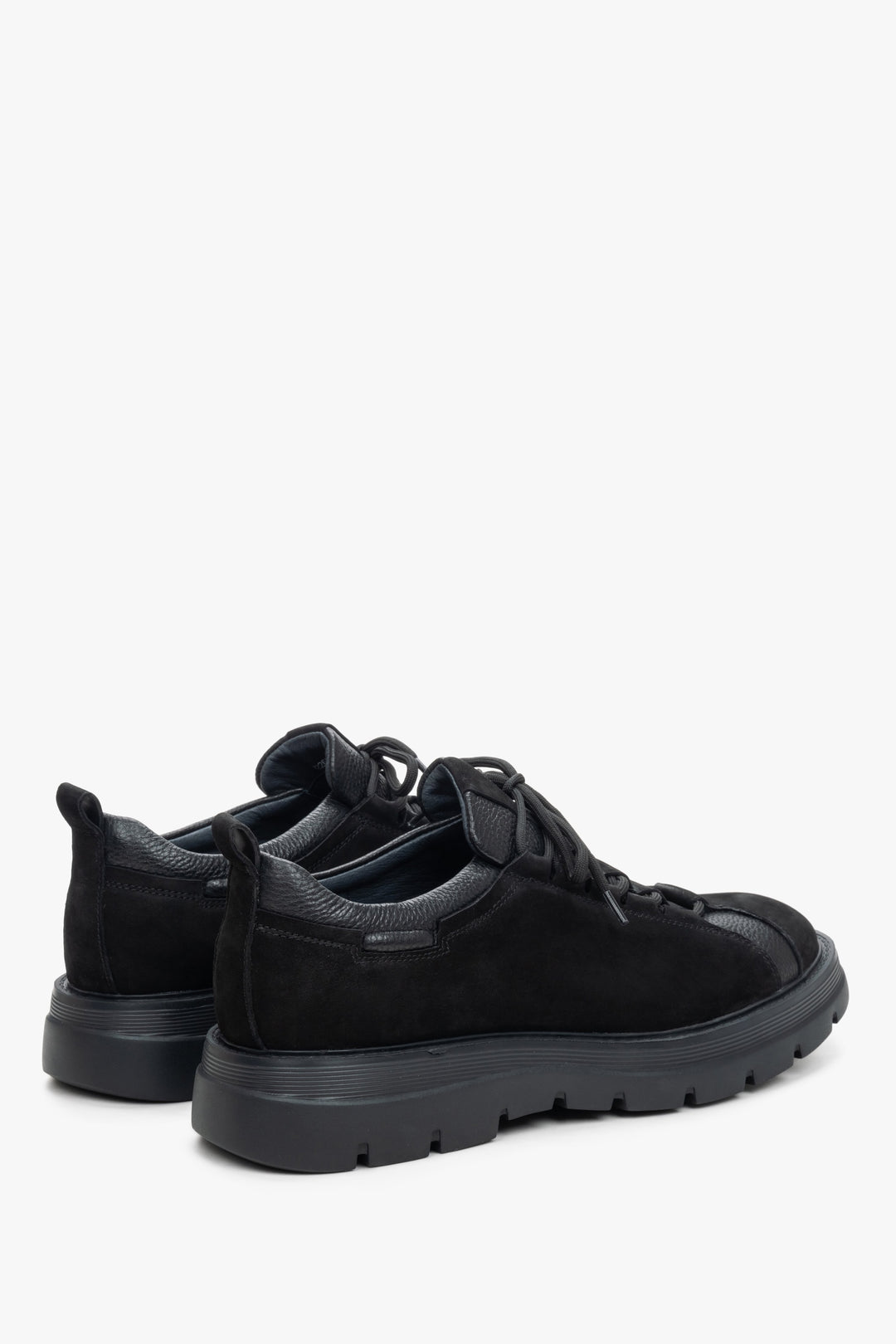 Men's black leather and nubuck sneakers - close-up on the side line and heel.