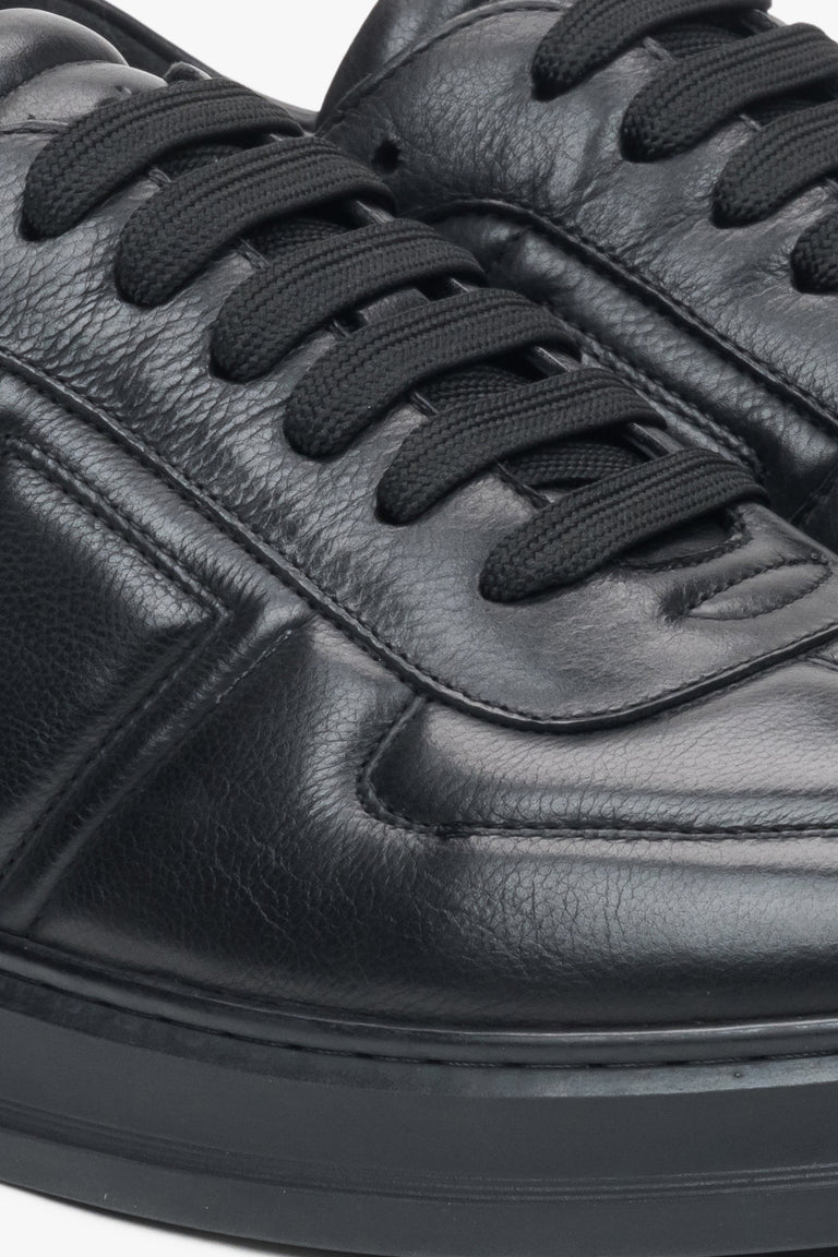 Black leather men's sneakers Estro - close-up of stitching and details.