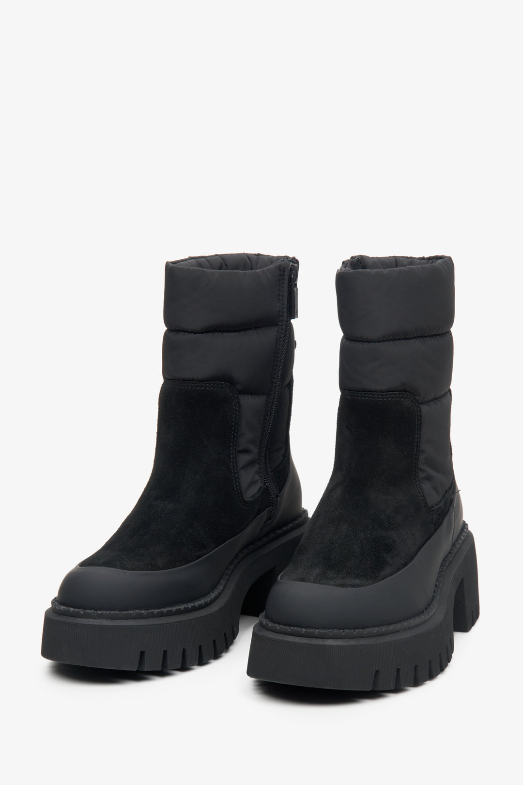 Women's Estro winter boots in black made of leather, velour, and nylon.