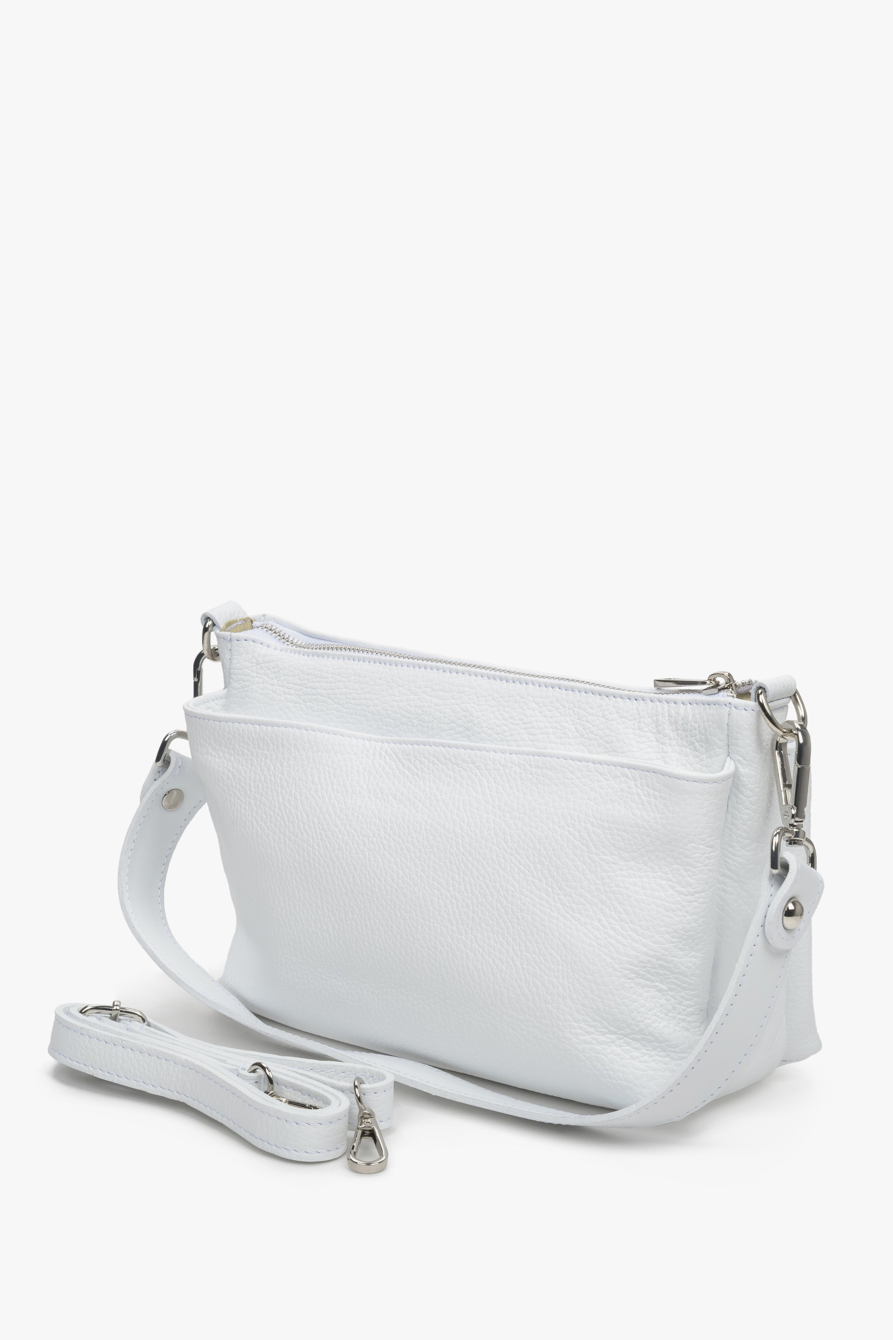 Women's white Estro crossbody bag made from genuine leather with a zipper.