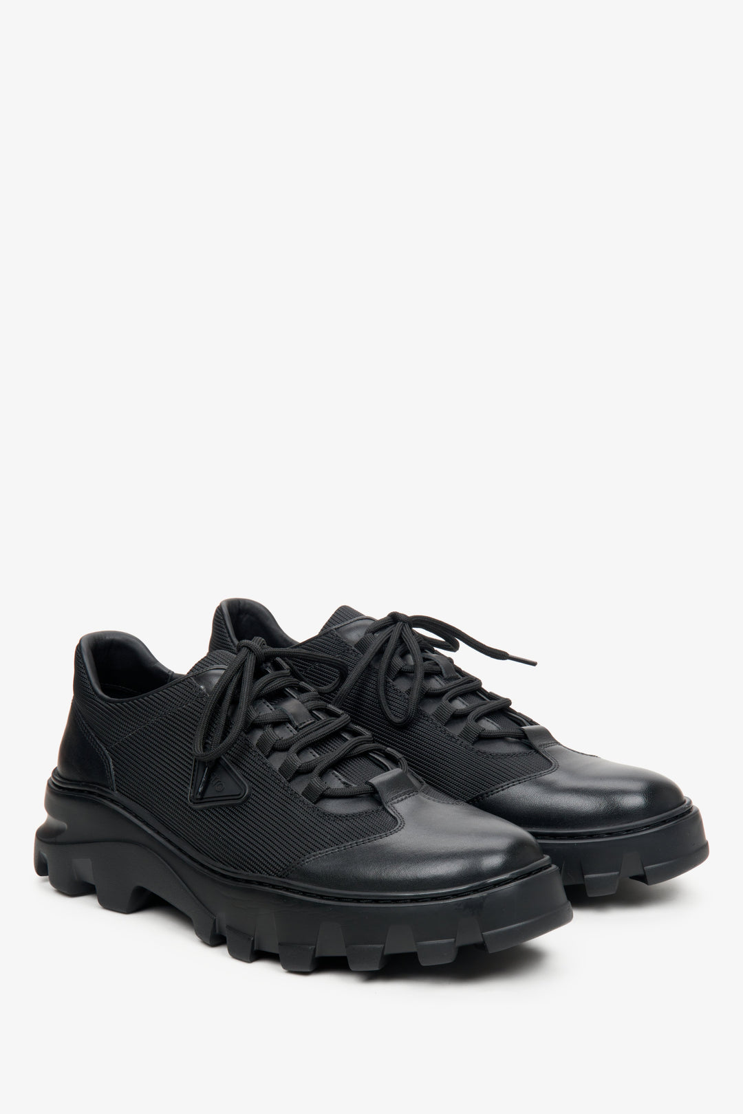 Men's black lace-up shoes made of mixed materials by Estro.
