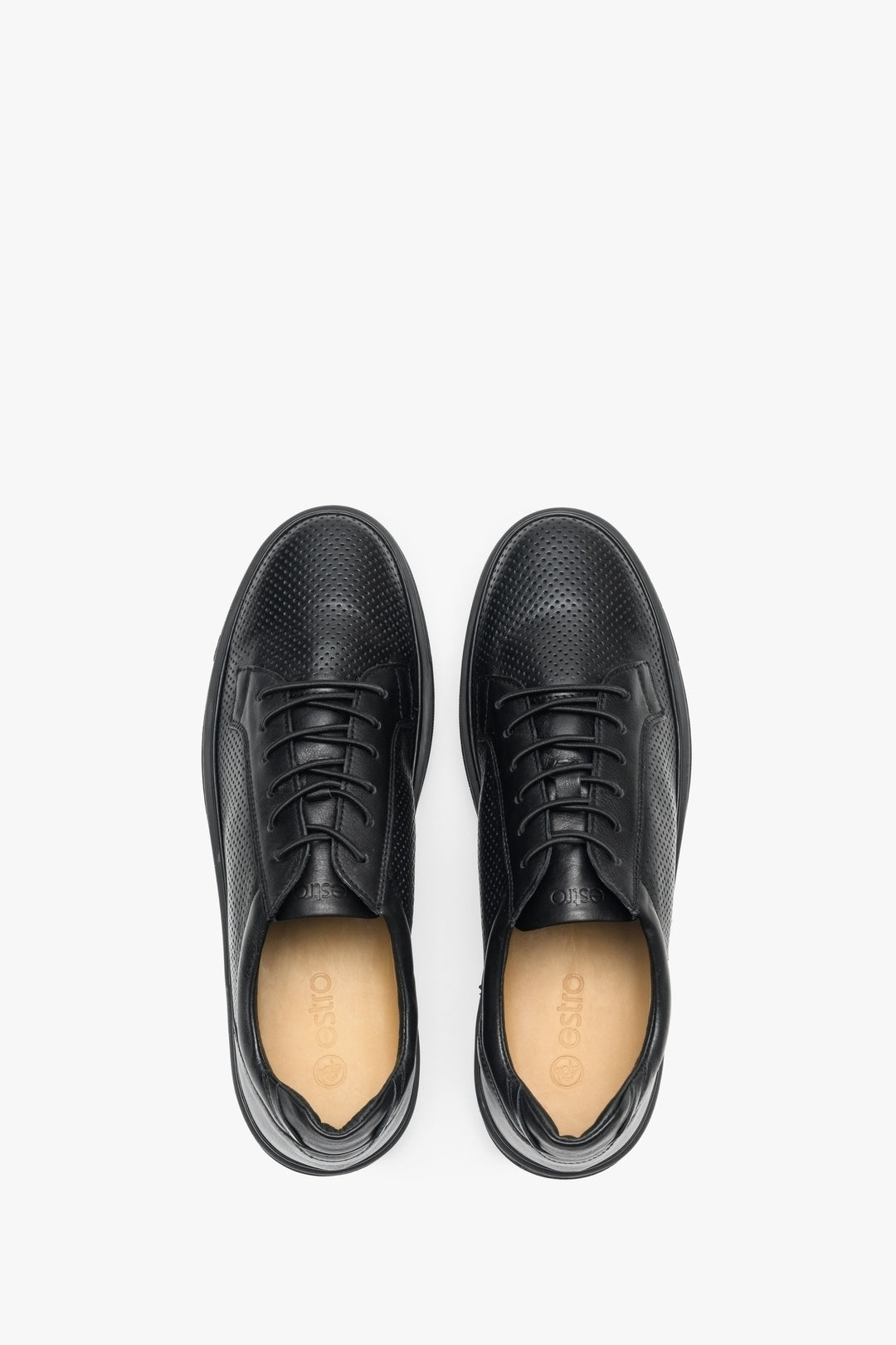 Men's leather sneakers for summer in black with perforation - presentation of shoes from above.