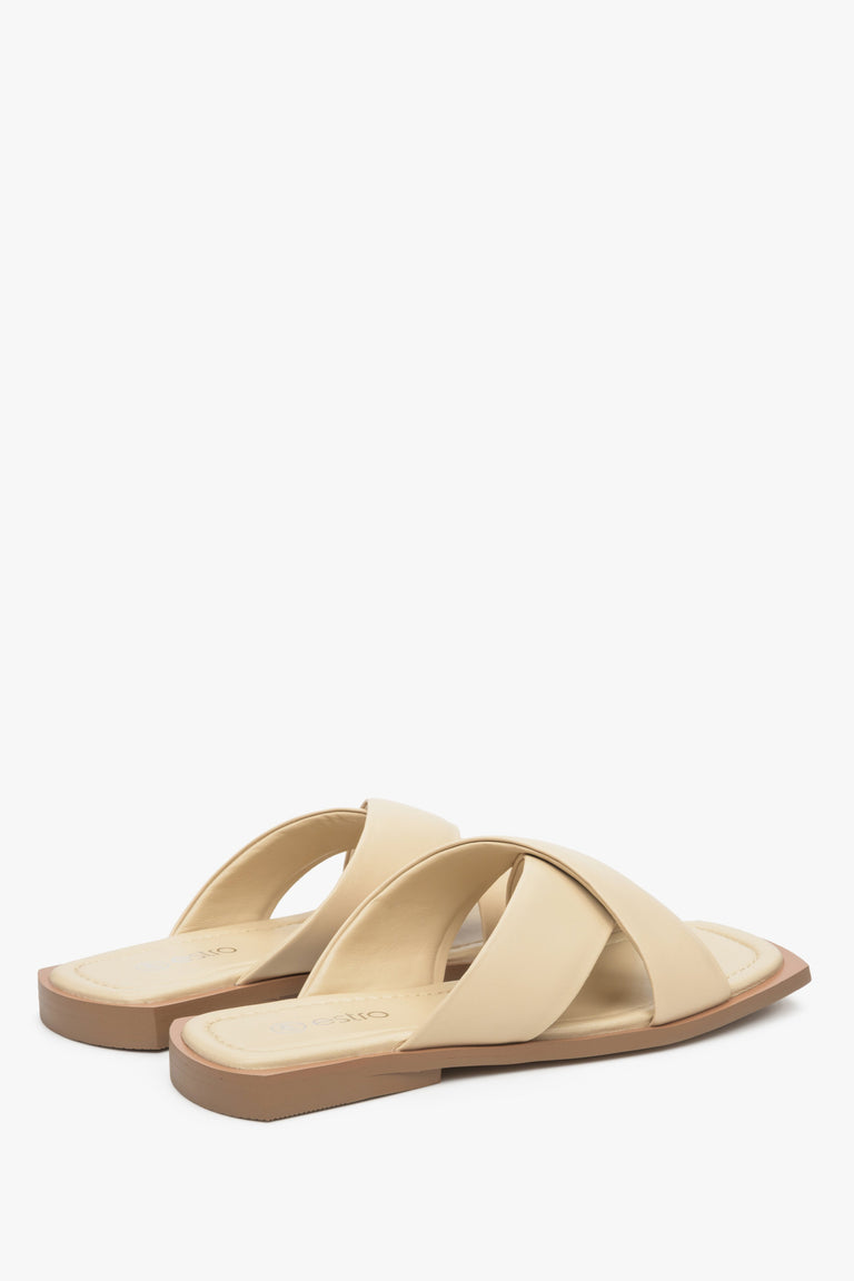 Women's beige slide sandals, Estro brand.