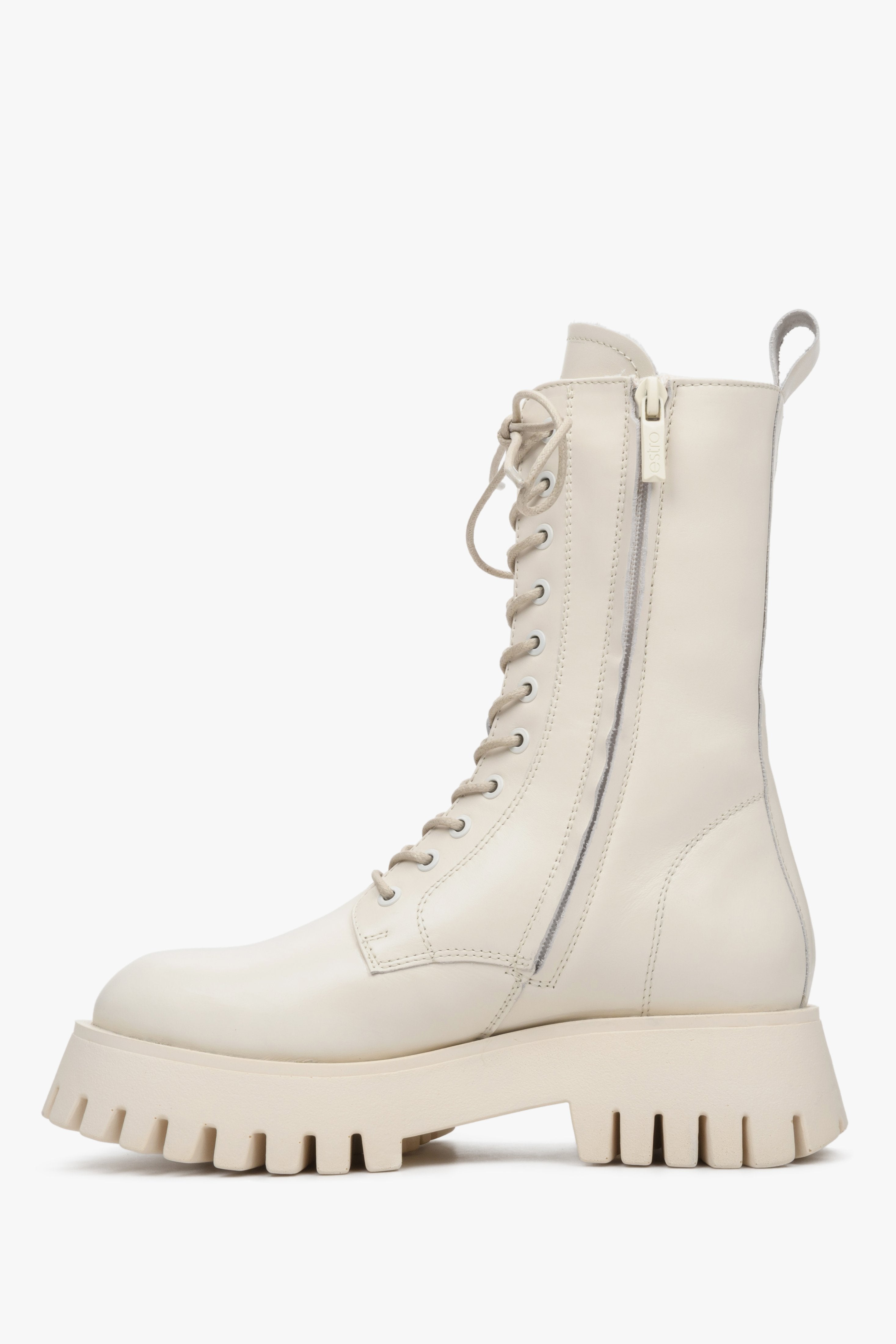 High, white leather women's lace-up boots by Estro - shoe profile.