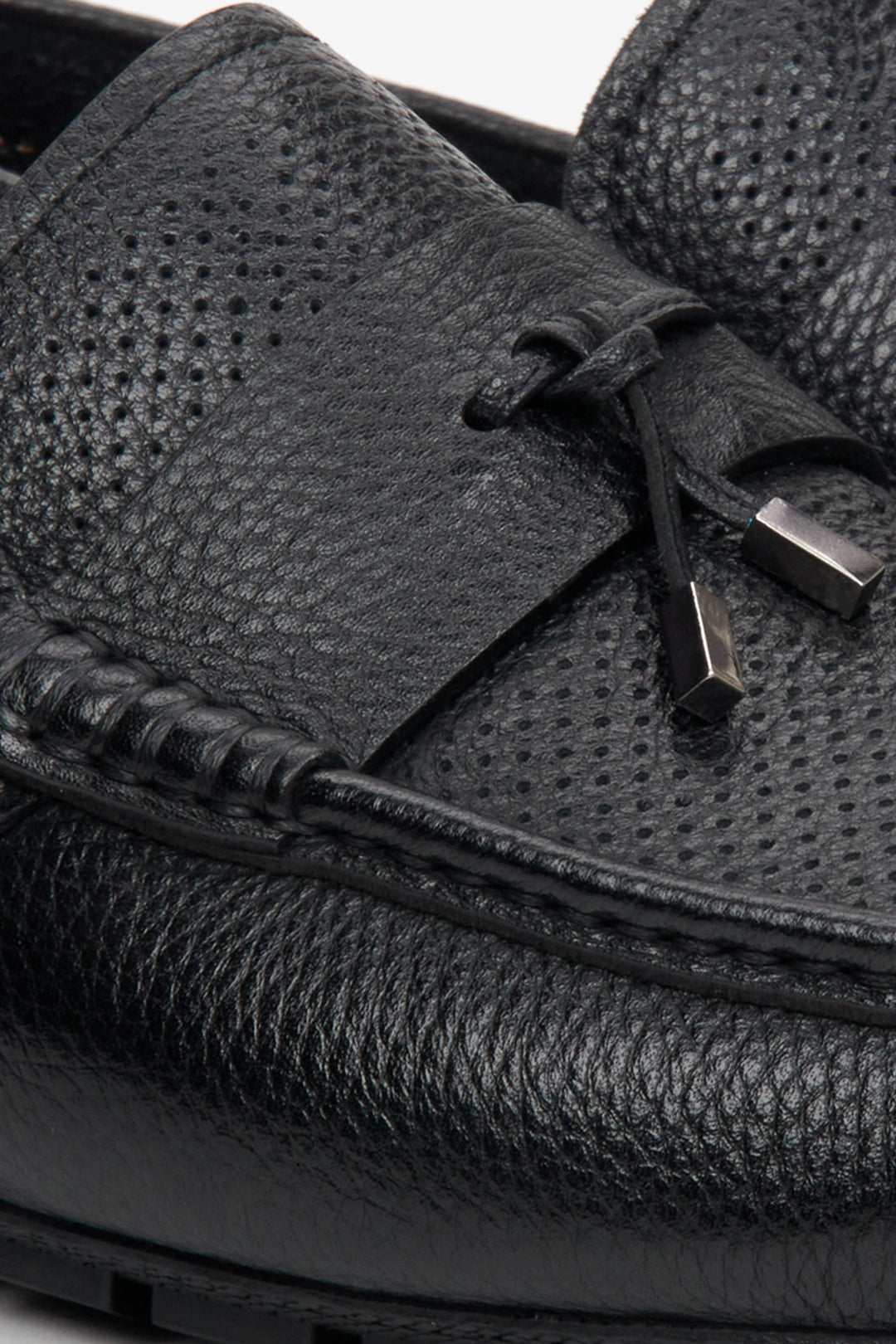 Men's black leather loafers for fall - close-up on the details.