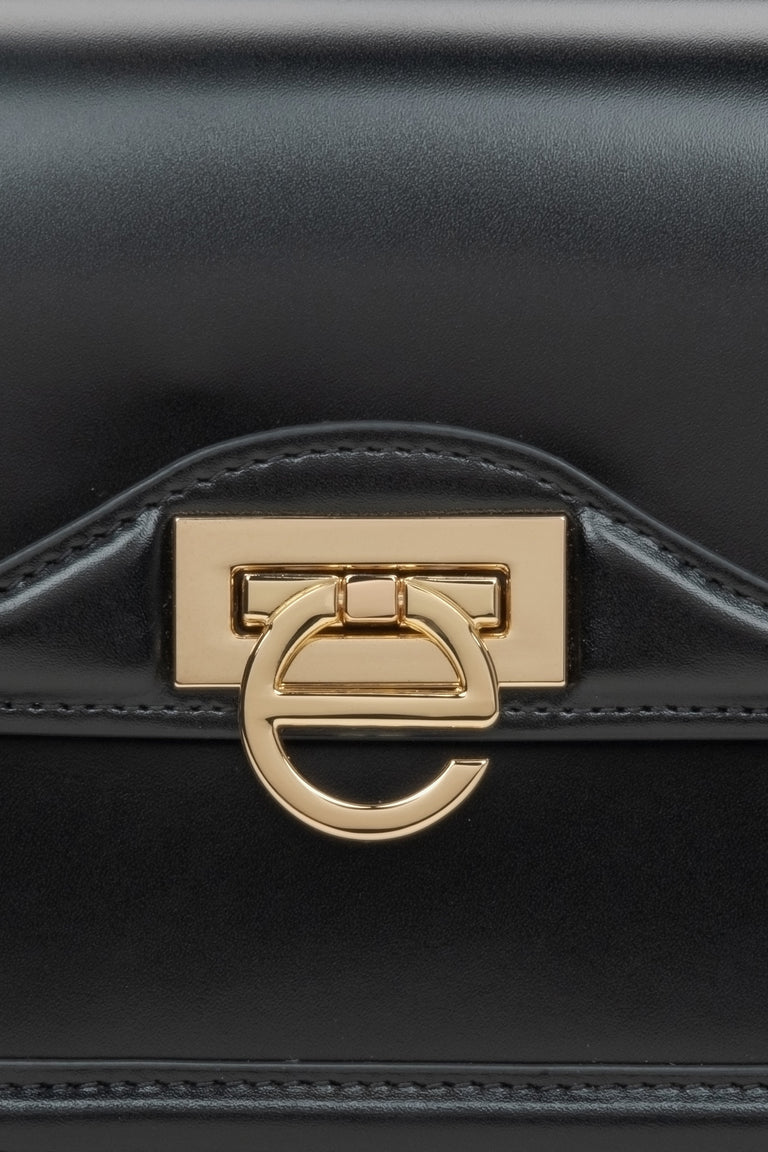 Small black leather women's handbag by Estro - details.