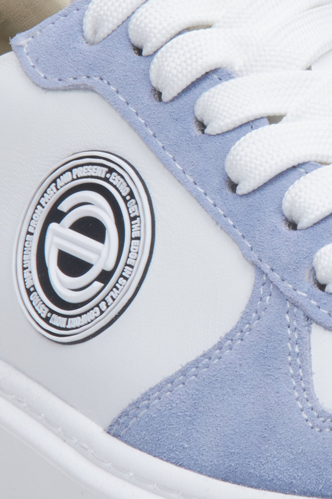 Blue and white sneakers for women, featuring leather and natural velvet - close-up on details.